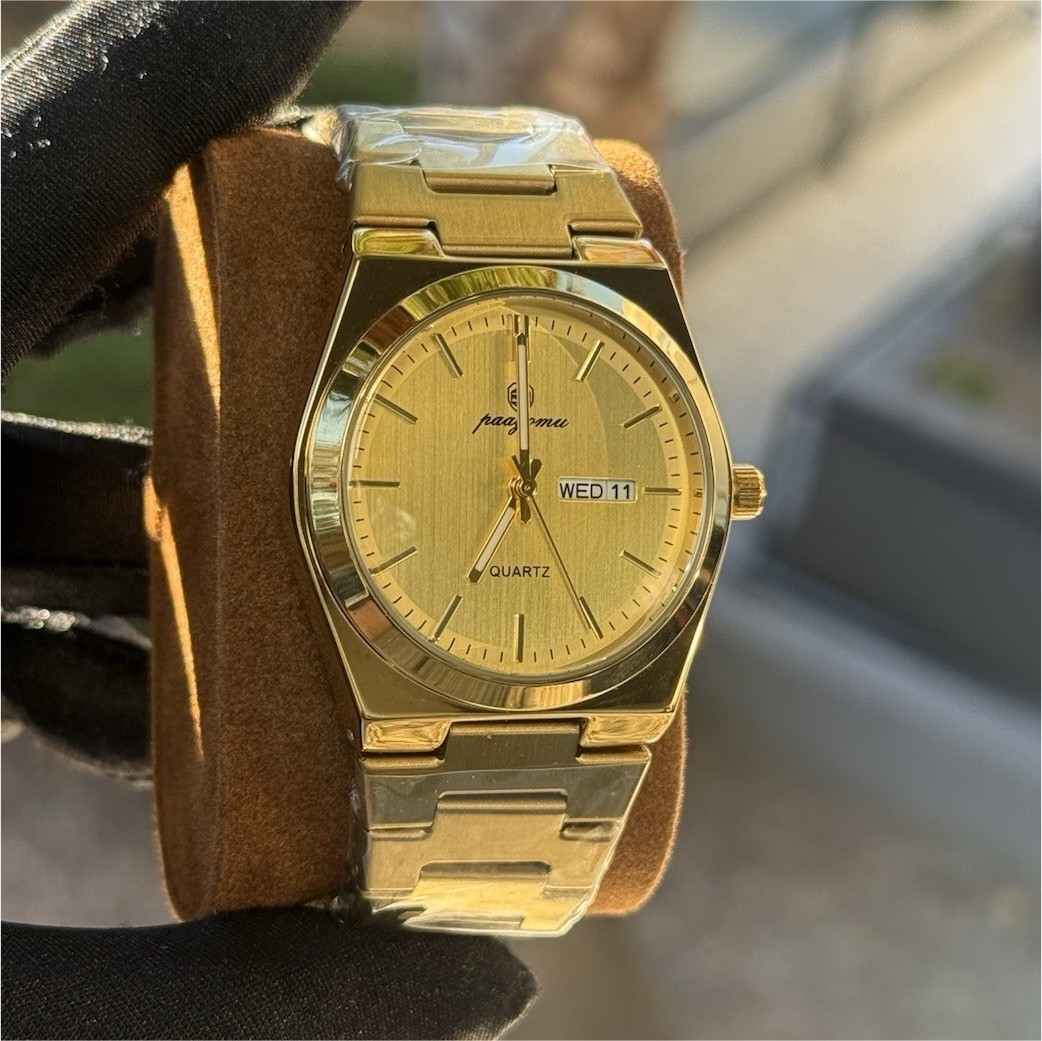 Reloj Nuevo Men’s Quartz Watch Day/Date Gold Tone Steel Bracelet 3ATM