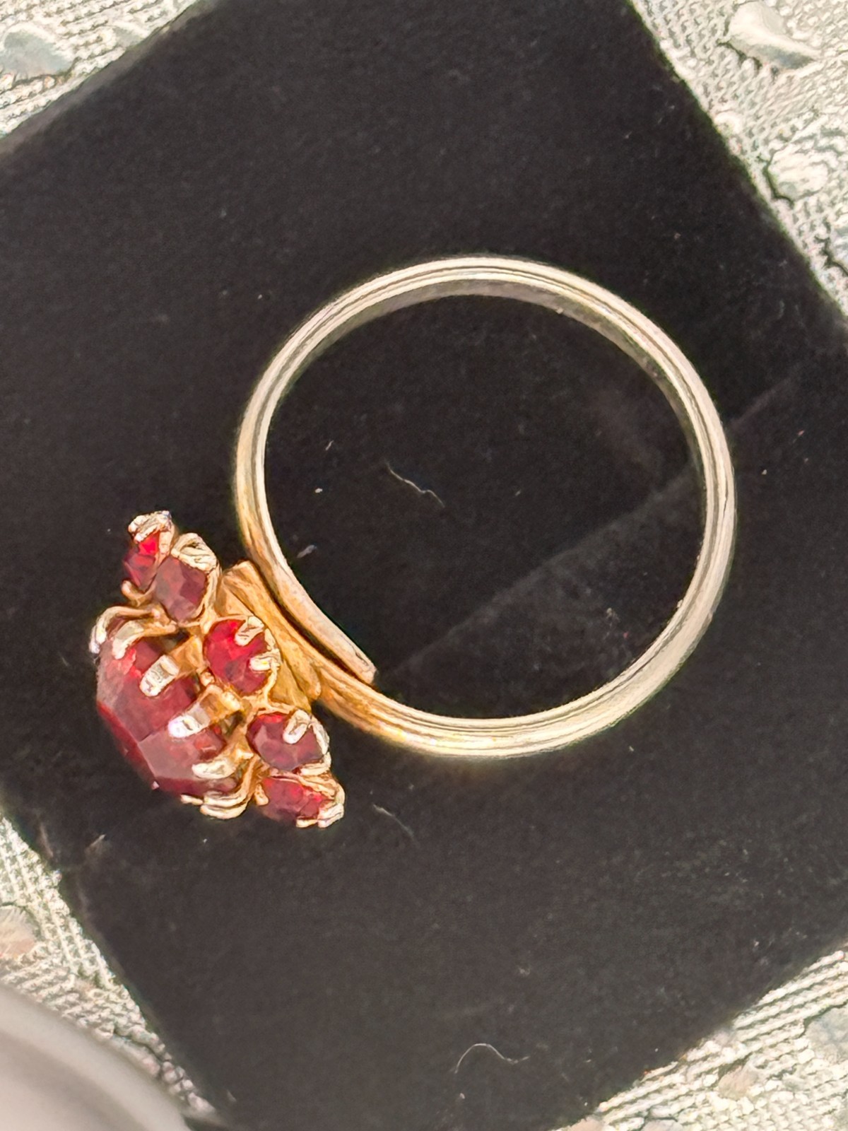 Deep Burgundy ring features a cluster of red rhinestones in a gold-tone setting.