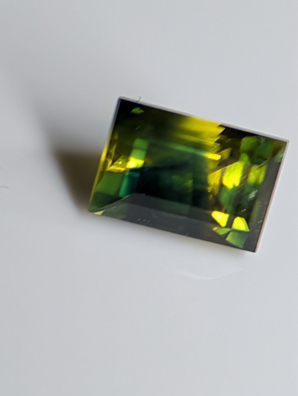 USA seller .63 IF Parti Sapphire faceted gemstone