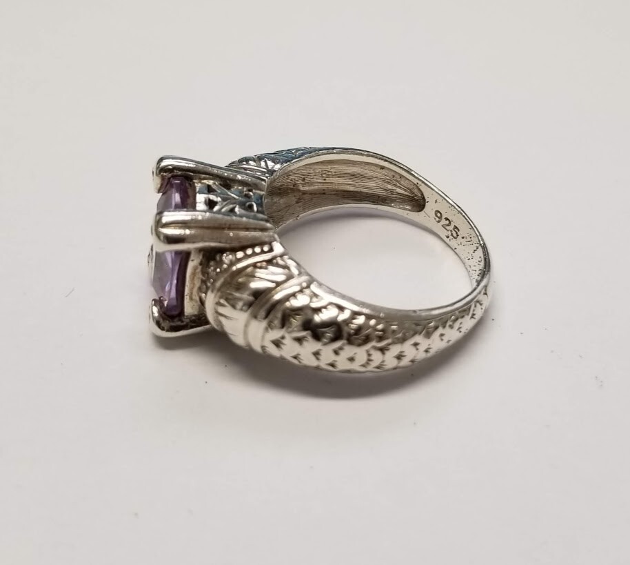 .925 STERLING SILVER RING WITH EMERALD CUT LAVENDER STONE SZ 8 8.6 GR. #5741