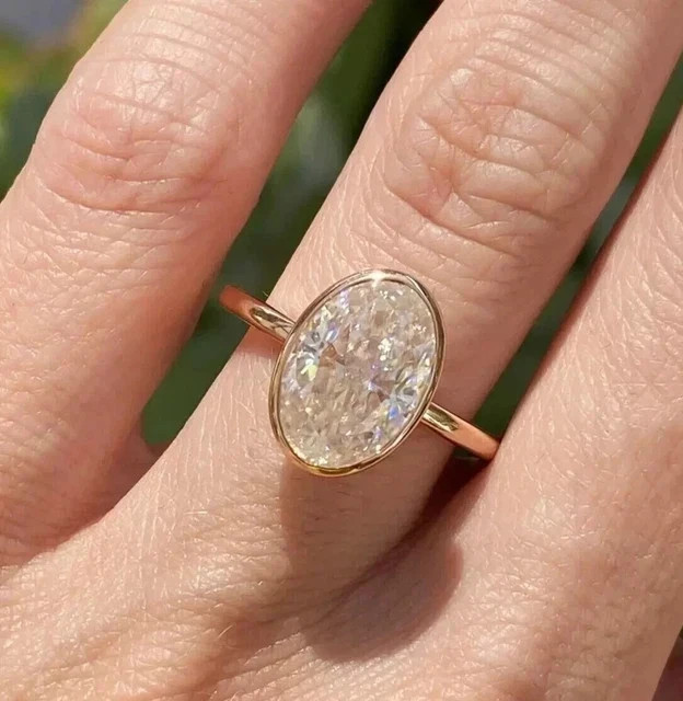 3Ct Oval Cut D/VVS1 Moissanite Bezel Set Engagement Ring 14k Yellow Gold Plated
