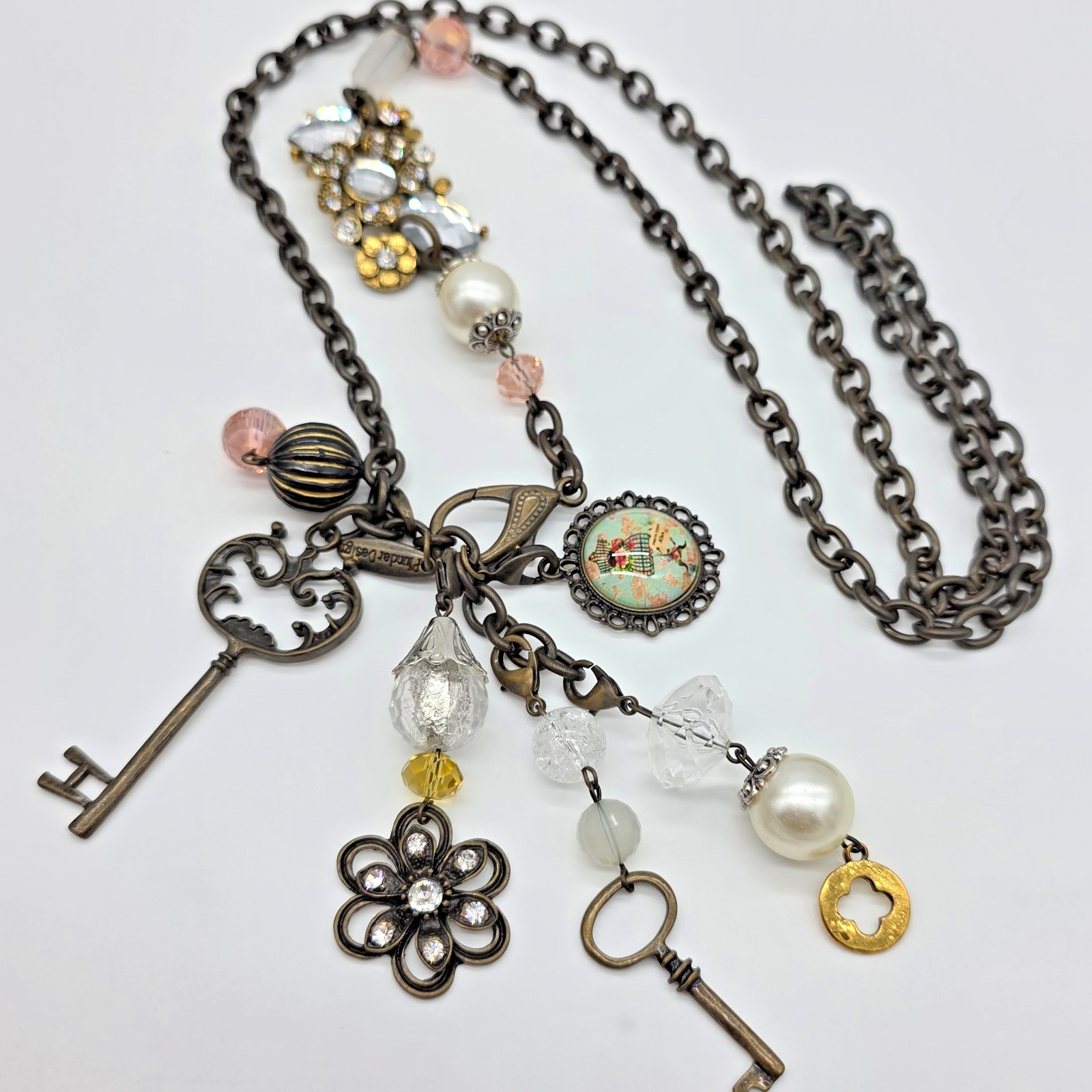 Plunder ADRIENNE Vintage Bronze Pearl Mannequin Key Tassel Charm Necklace 32”