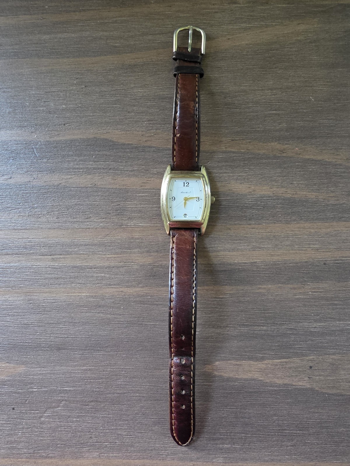 Vintage Eddie Bauer Watch Model 3556: Tonneau (barrel-shaped) Gold Tone Leather