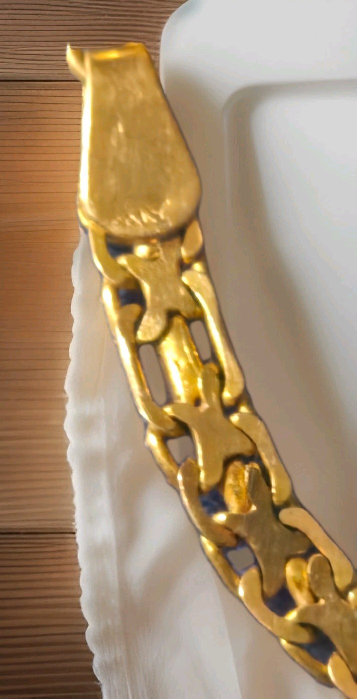 a vintage 14k Italian yellow gold figaro link bracelet 585
