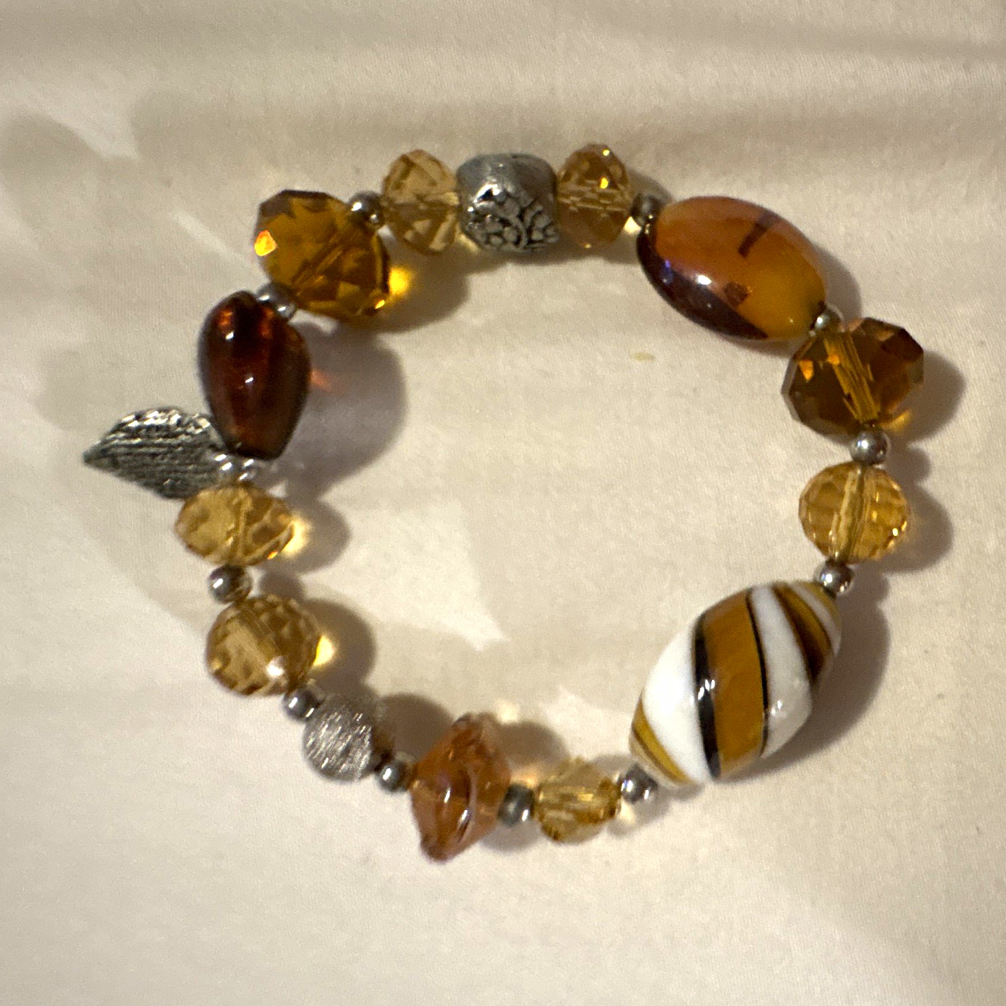 Brown Gold White Beaded Stretch Bracelet Glass Metal Leaf Dangle Charm