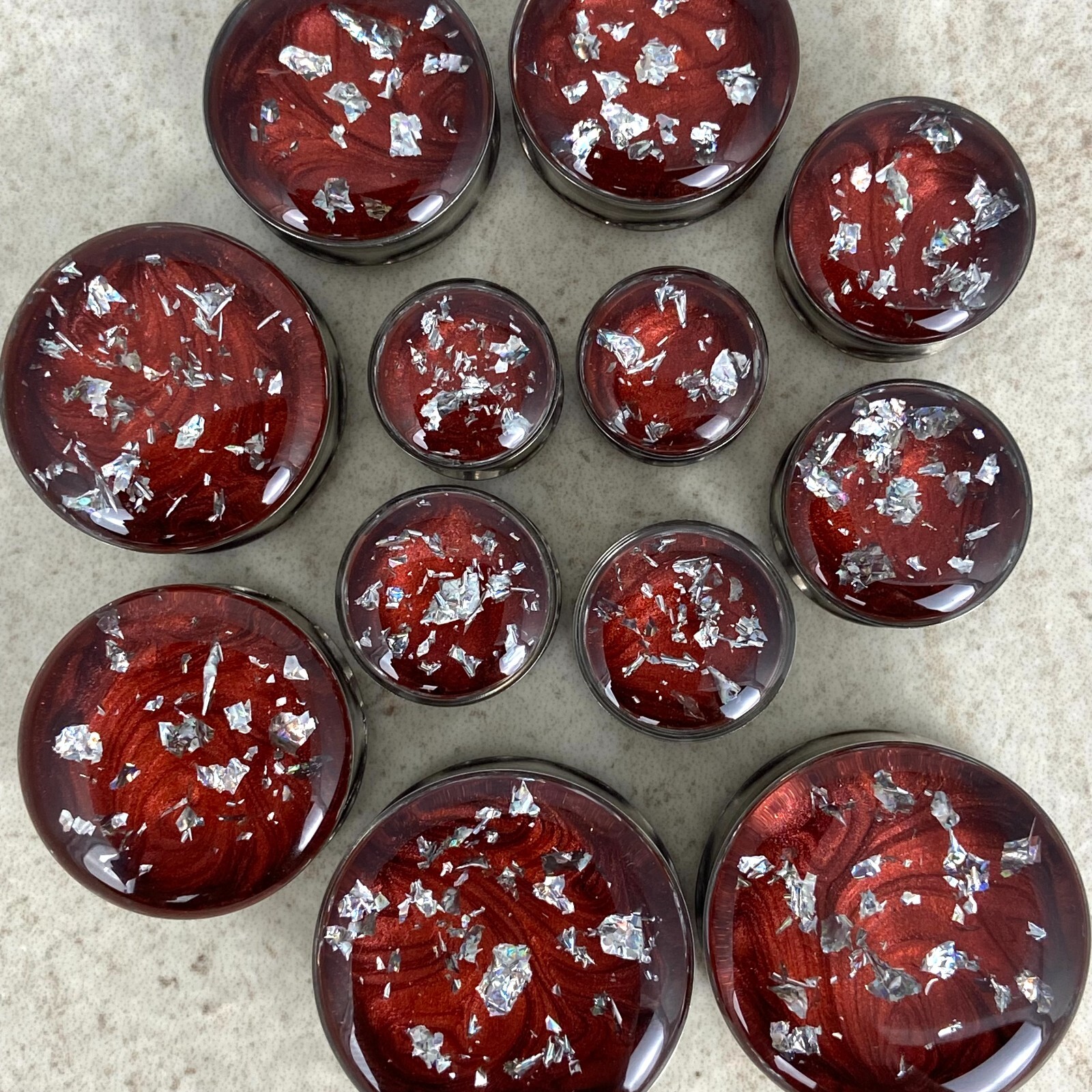 Stainless Steel Plugs with Embedded Red Pearlescent Resin Silver Flakes gauges