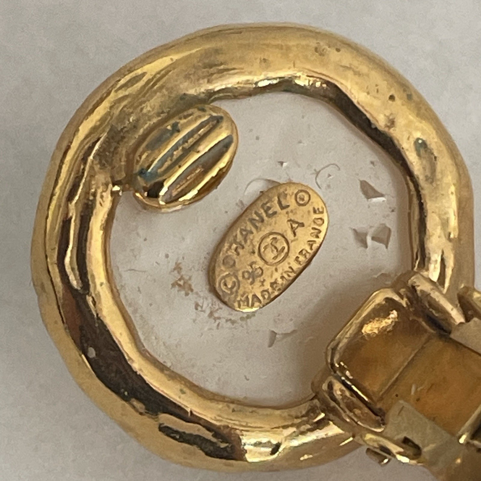 Auth. vtg CHANEL 1995 gold 3D CC logo dangle with round moonlight stone stamped