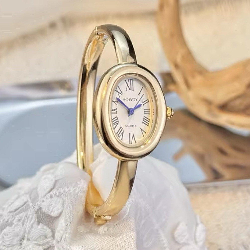 HOWDY Women’s Quartz Analog Oval Bangle Wristwatch Gold Tone Roman Dial