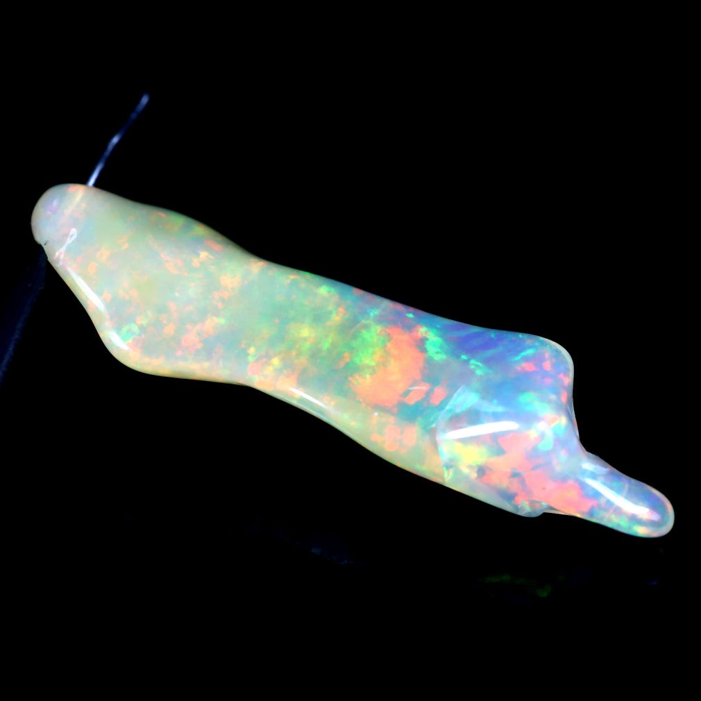 7.71 ct Fancy With Hole (34.65 x 10.15 mm) Ethiopian Rainbow Opal Stone