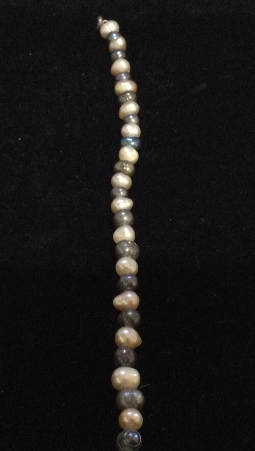 Peach and blue/gray freshwater pearl bracelet.