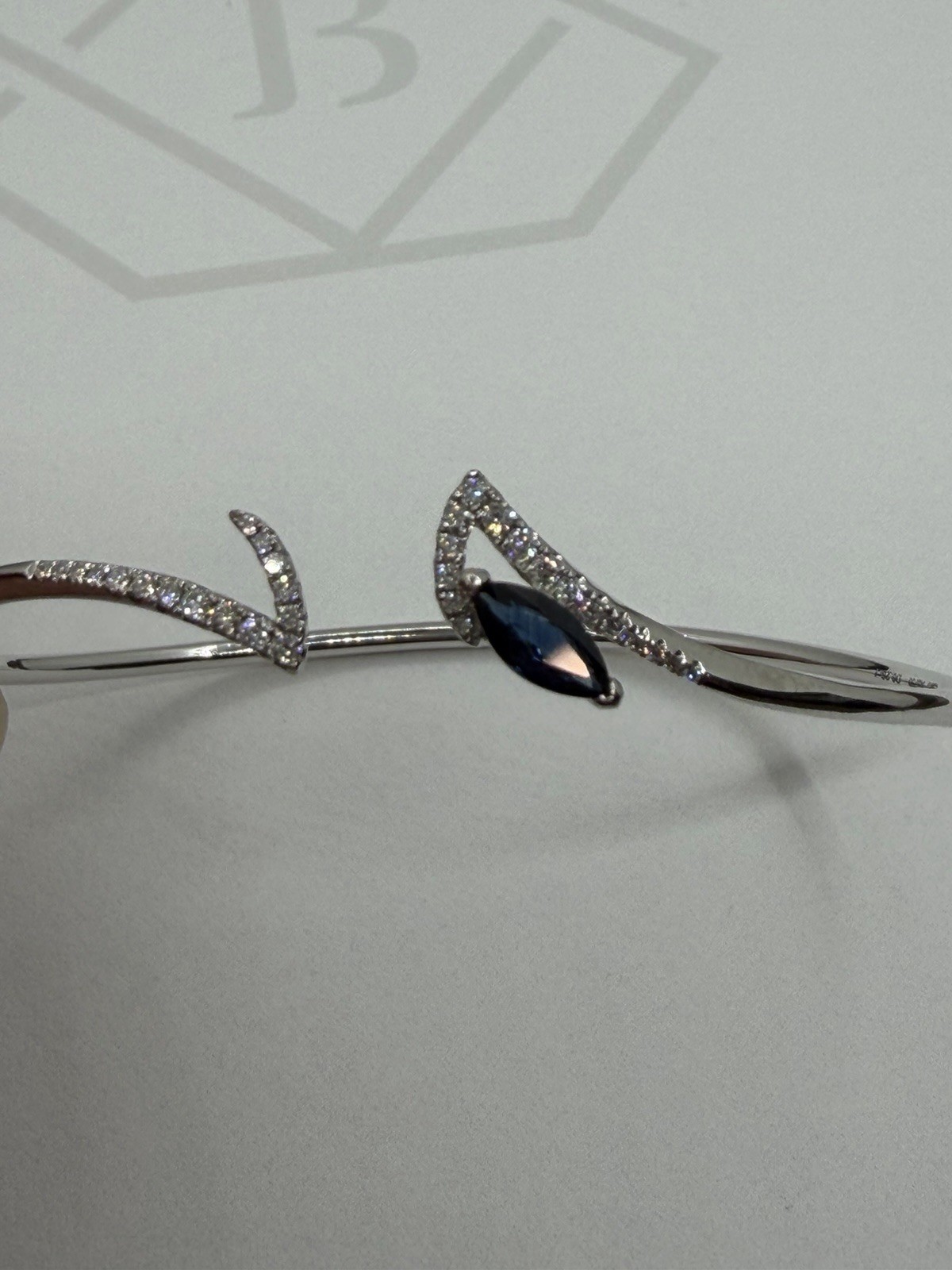 Appraised 18k white gold diamond Sapphire Contoured 5.2 Grams bangle bracelet
