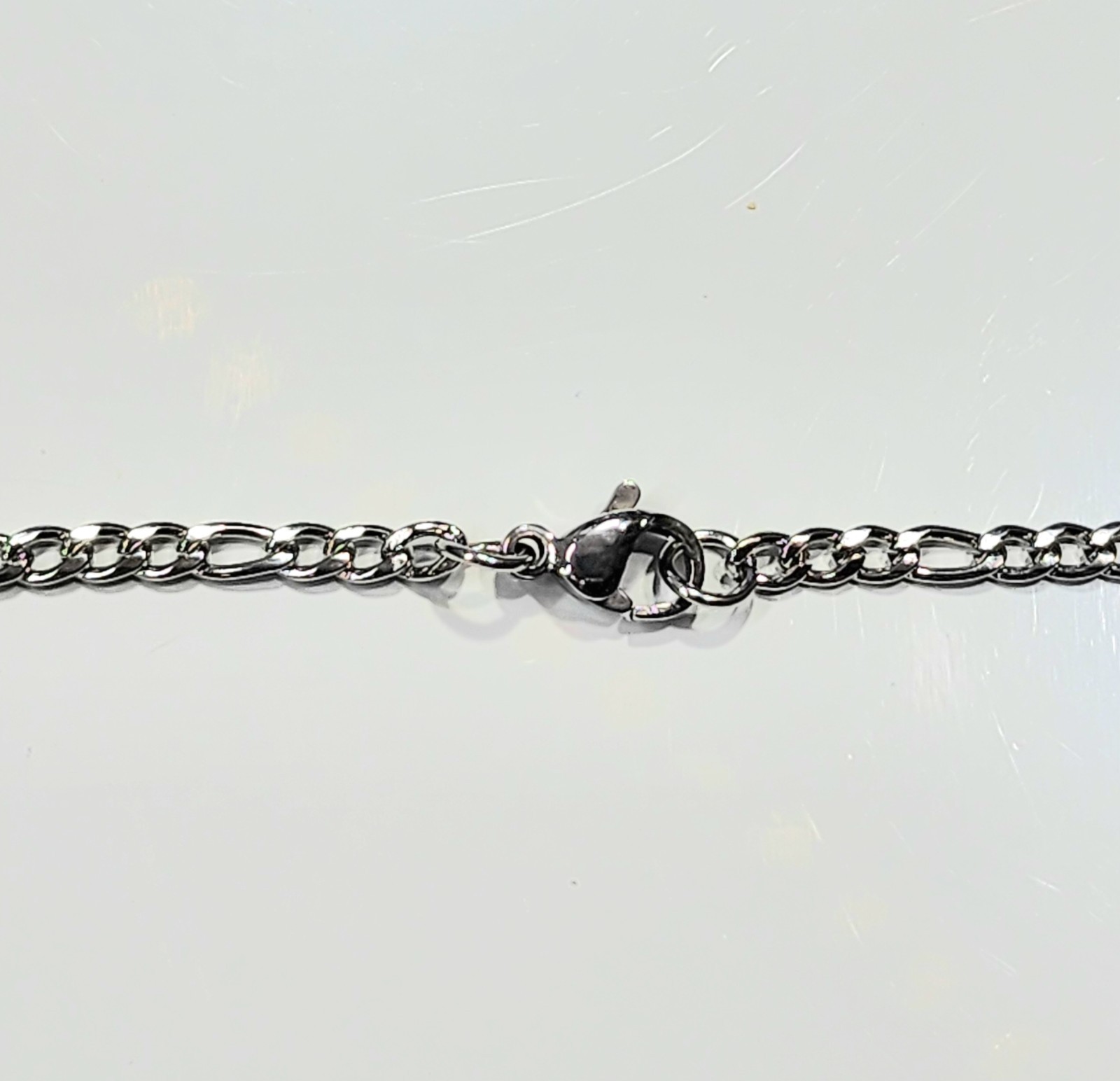 Stainless Steel Cross 1.5 inch Long with 18-inch Long 2.5mm Figaro Chain
