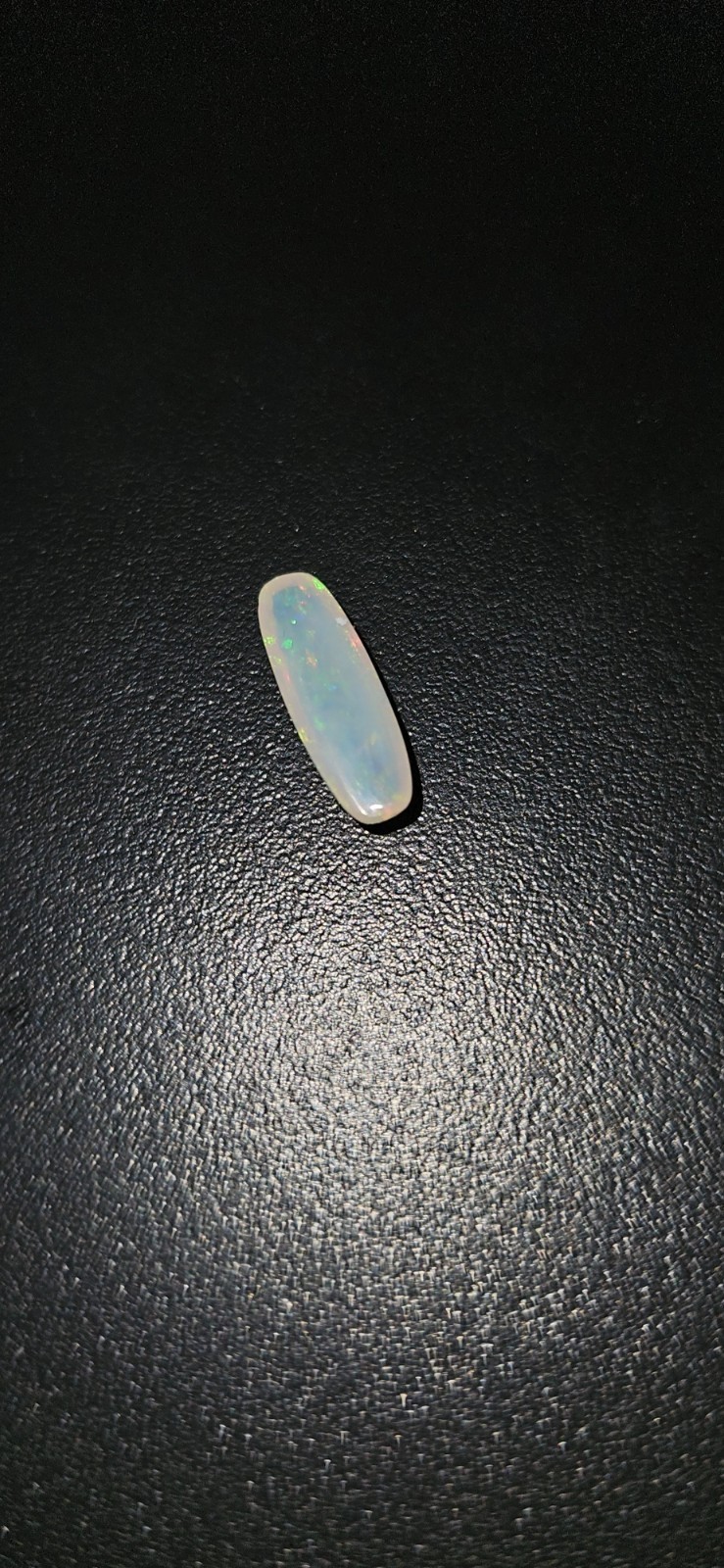 Long Cushion Cut Natural Crystal Opal. 1.18 Carats 12mm x 4mm x 3mm