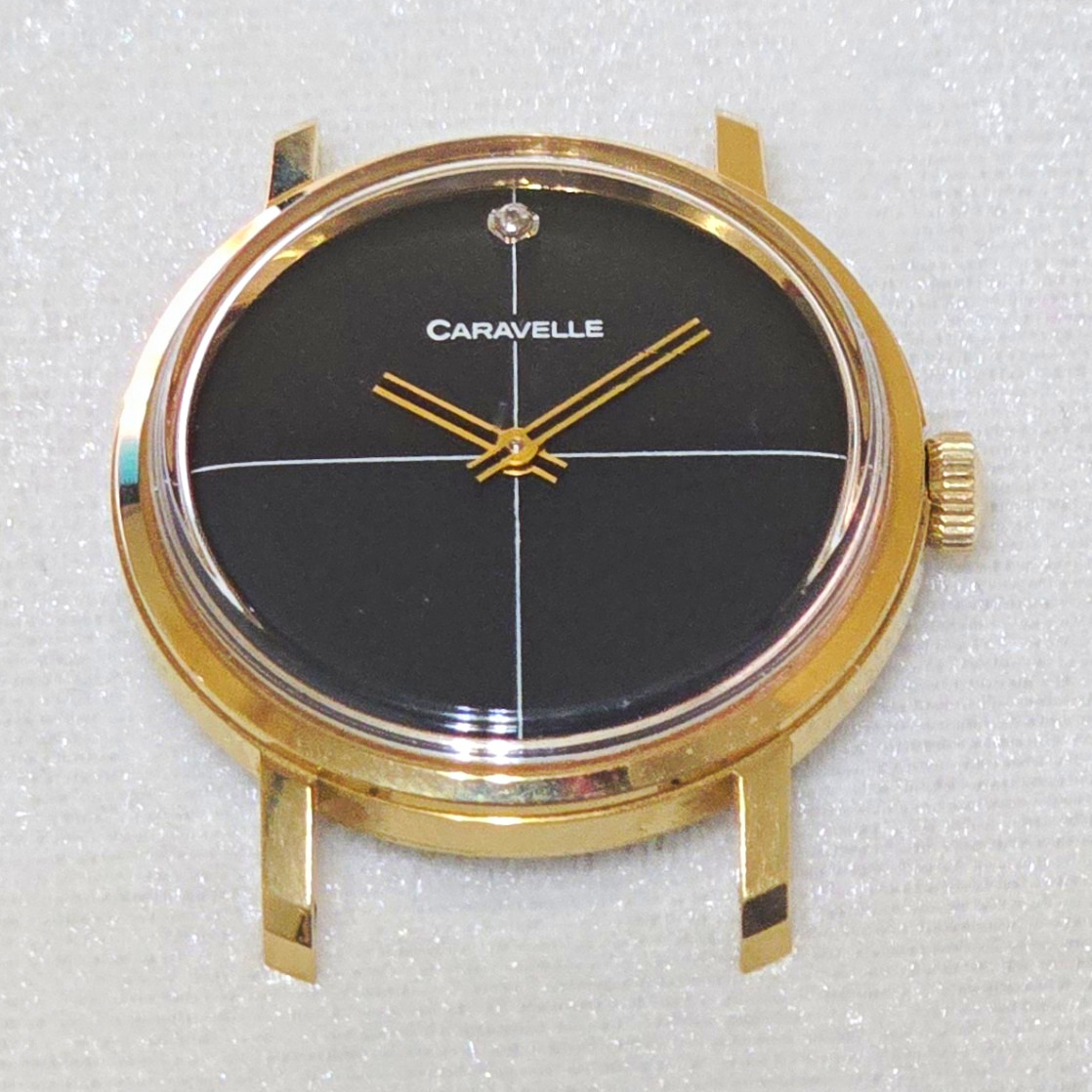 Caravelle Mechanical Analog Dress Watch Black Dial Gold Tone Case No Hour Marks