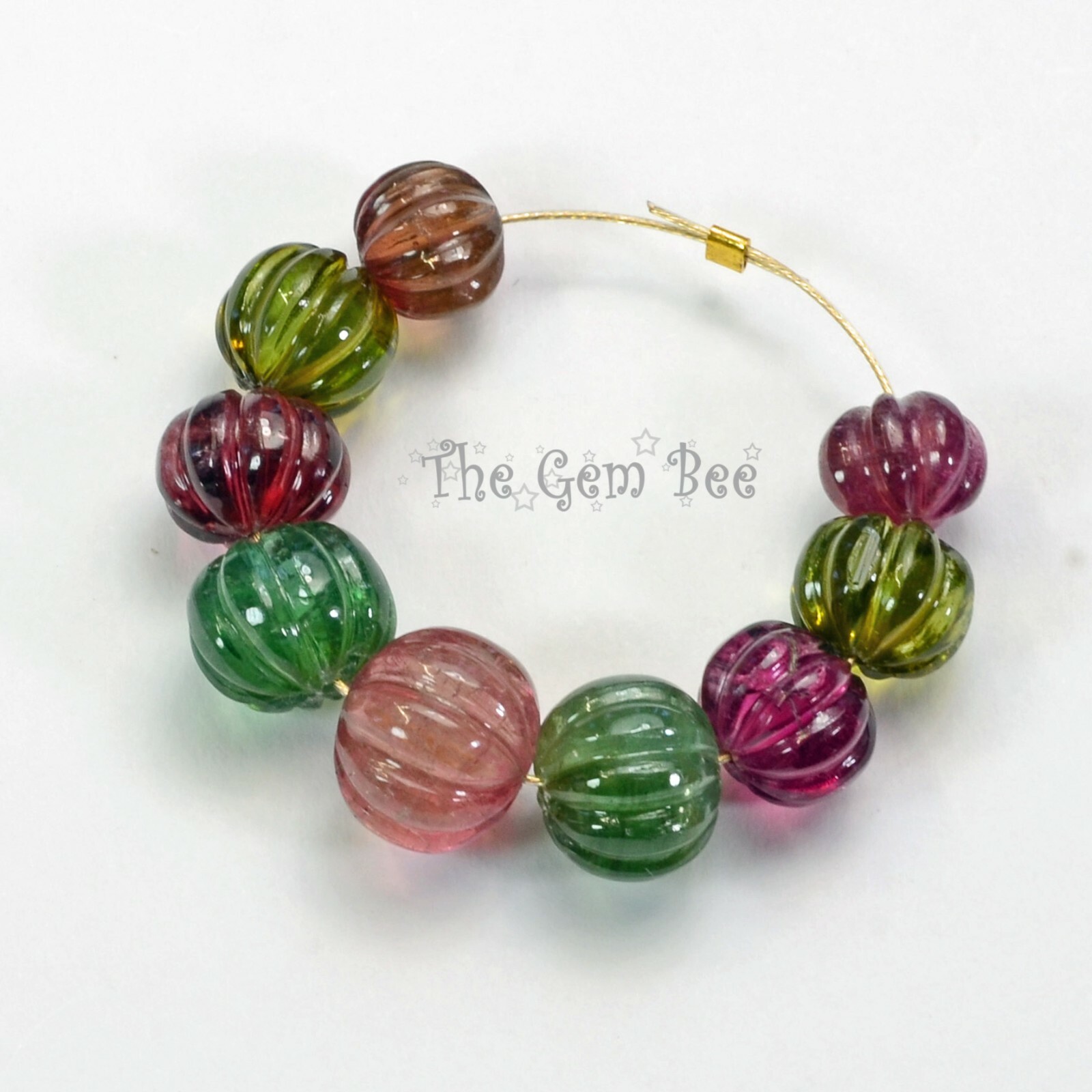 7.8mm-10.6mm Fine Candy Tourmaline Carved Melon Fluted Bead 2.7″ Strand (9)