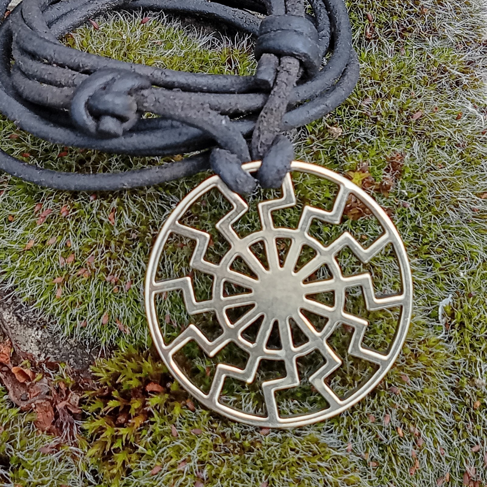 Black Sun Pendant Necklace – Brass Sonnenrad Medallion on Black Cord