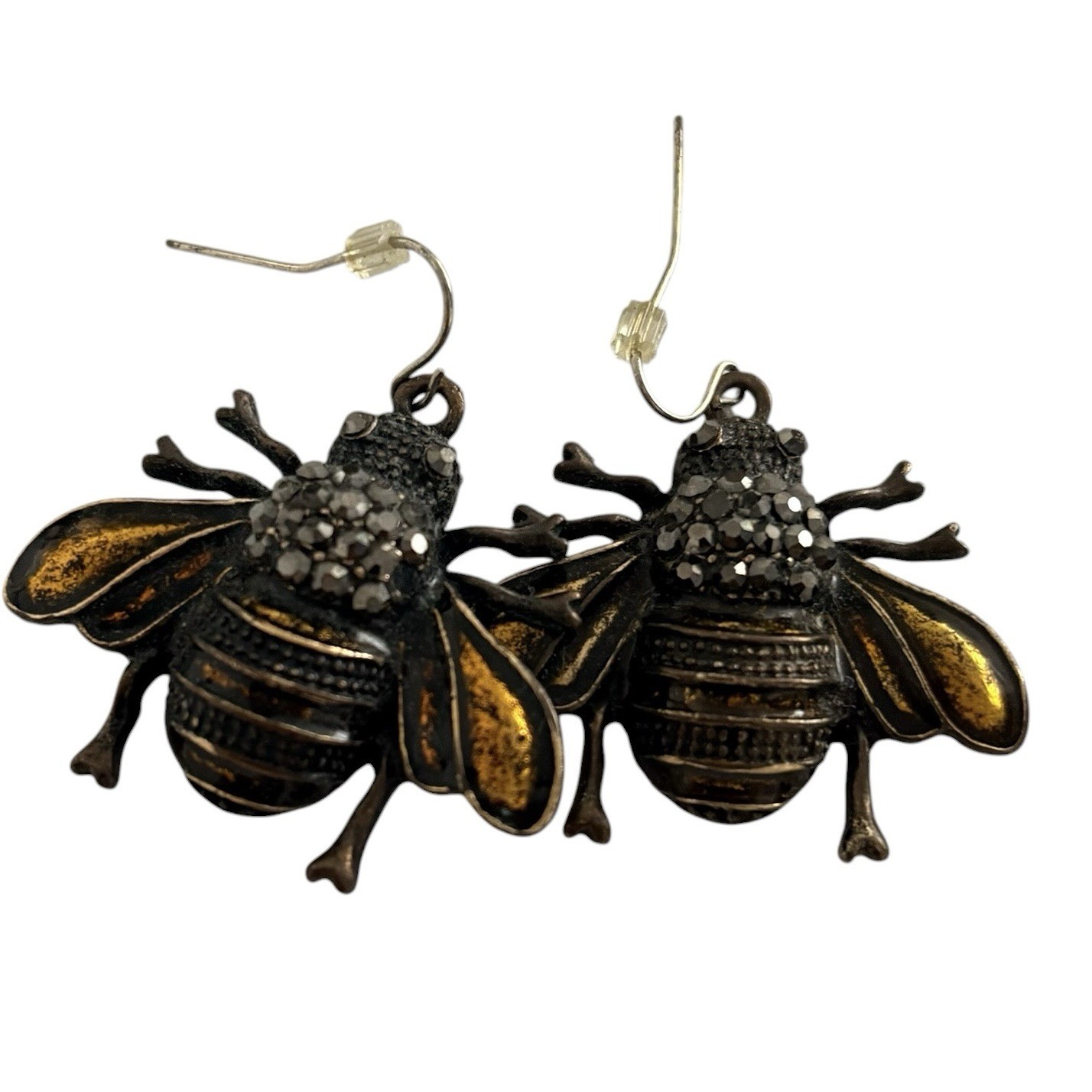 antique brass bee charm earrings on hook wires. Bold bee-shaped dangle earrings.