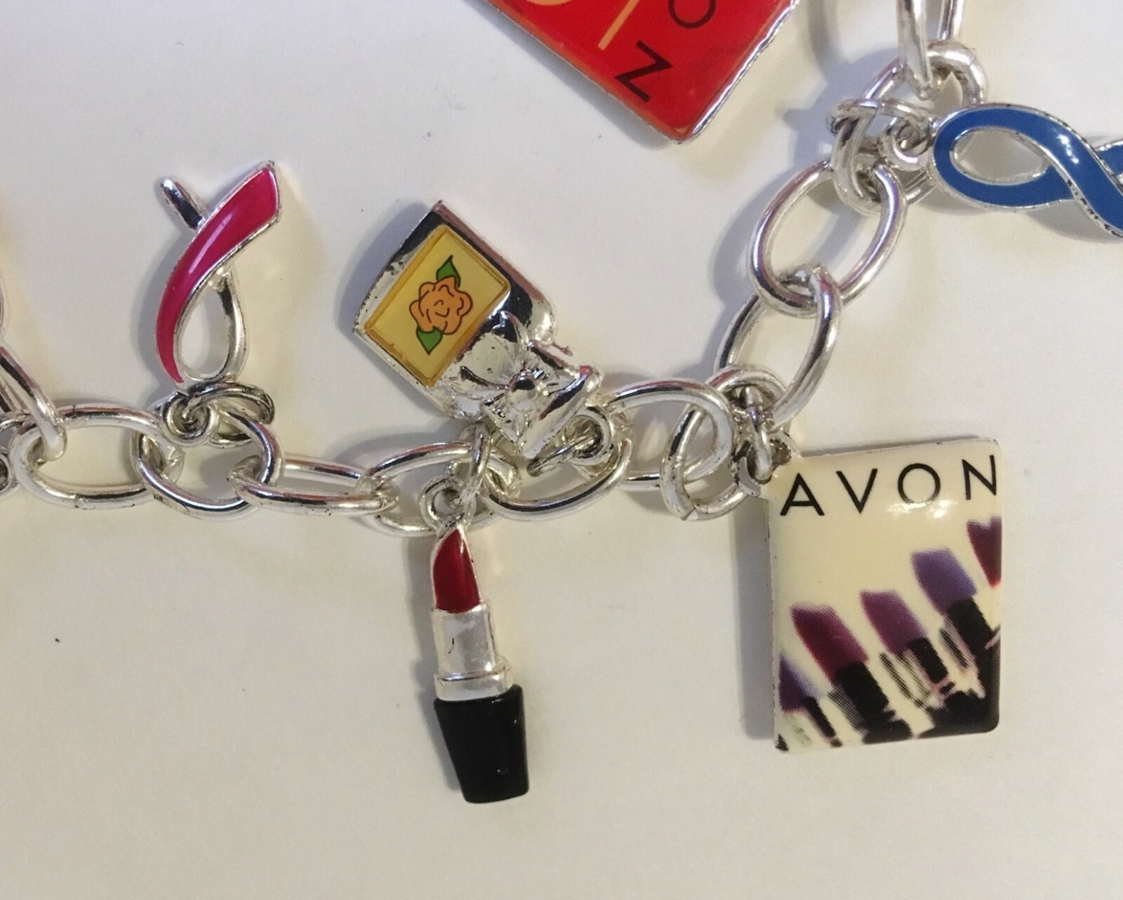 Avon 12 Charms Bracelet Silver Metal Link Chain 125 Years Anniversary Lipstick