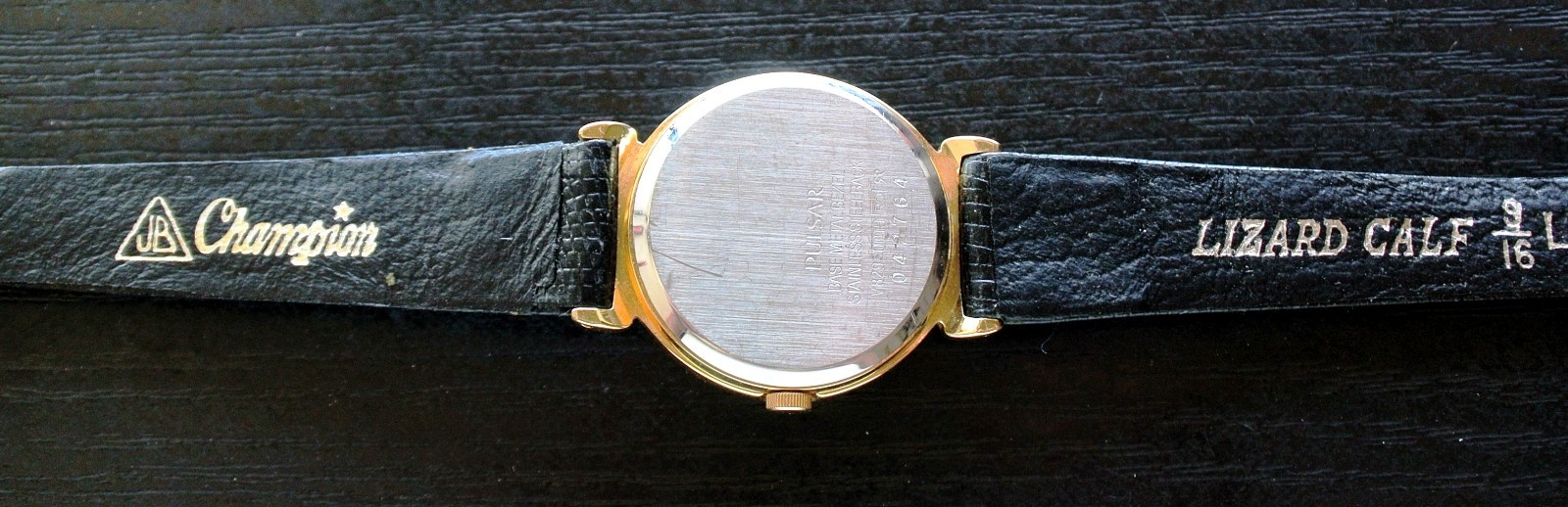VINTAGE PULSAR SEIKO ELEGANT MOON PHASE QUARTZ WOMEN’S GOLDEN BLACK DRESS WATCH