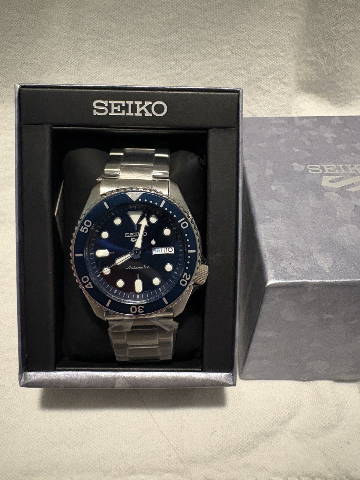 Seiko Men’s 5 Sports Automatic Blue Dial Blue Bezel Men’s Watch – SRPD51K1 NEW