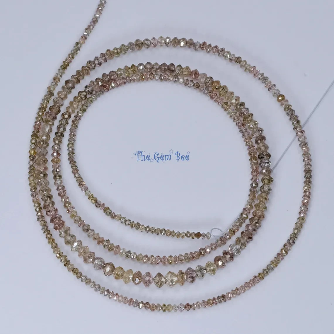 1.3mm-3mm Natural Pinkish Brown Champagne Diamond Faceted Rondelles Beads18″ Str