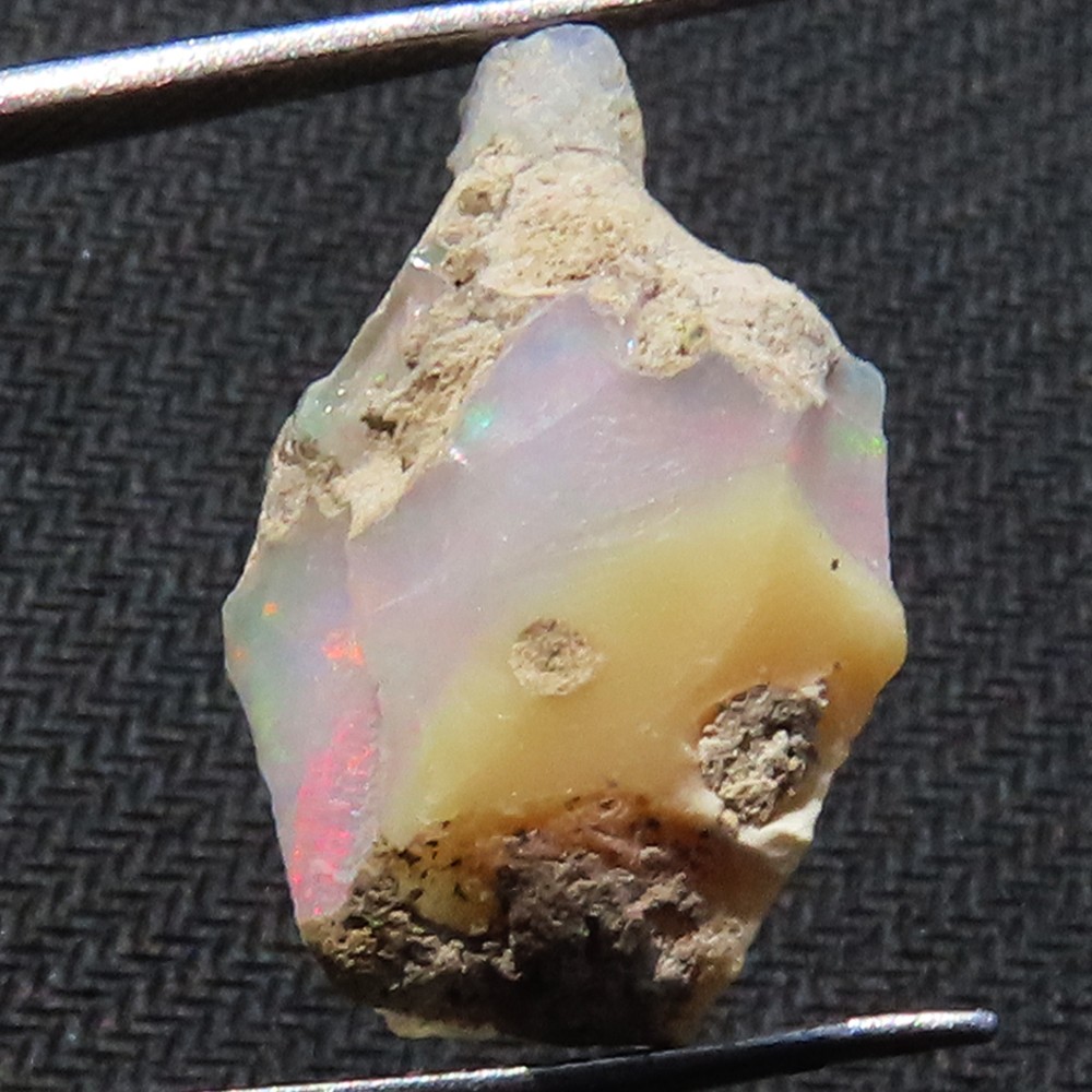 NATURAL PLAY OF COLOR ETHIOPIAN OPAL ROUGH GEMSTONE 8.20 Cts. (14x22x08 mm) M_05