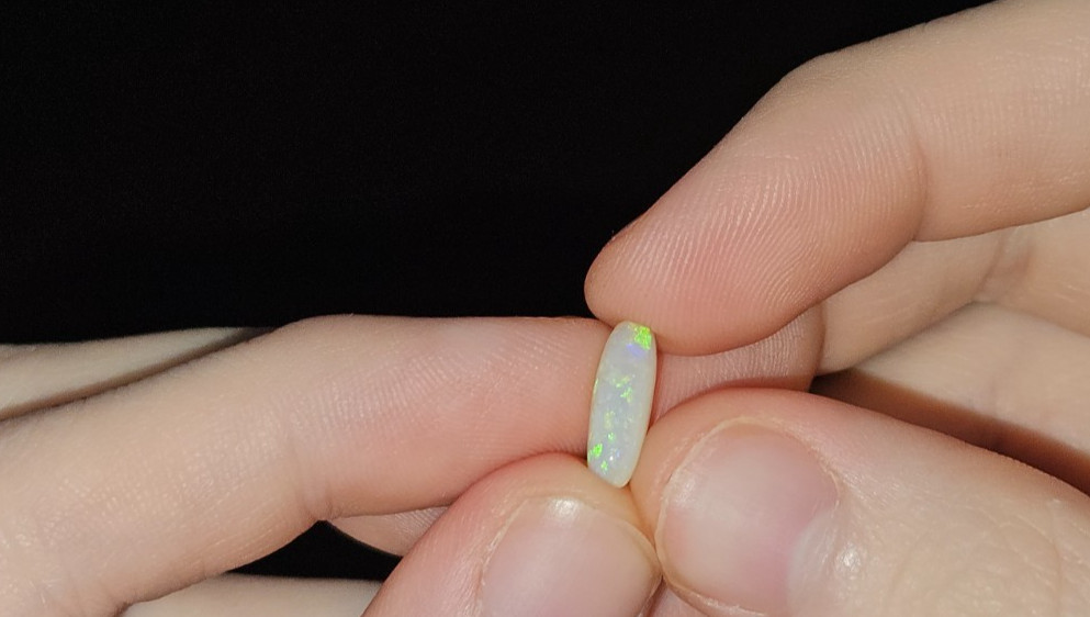 Long Cushion Cut Natural Crystal Opal. 1.18 Carats 12mm x 4mm x 3mm