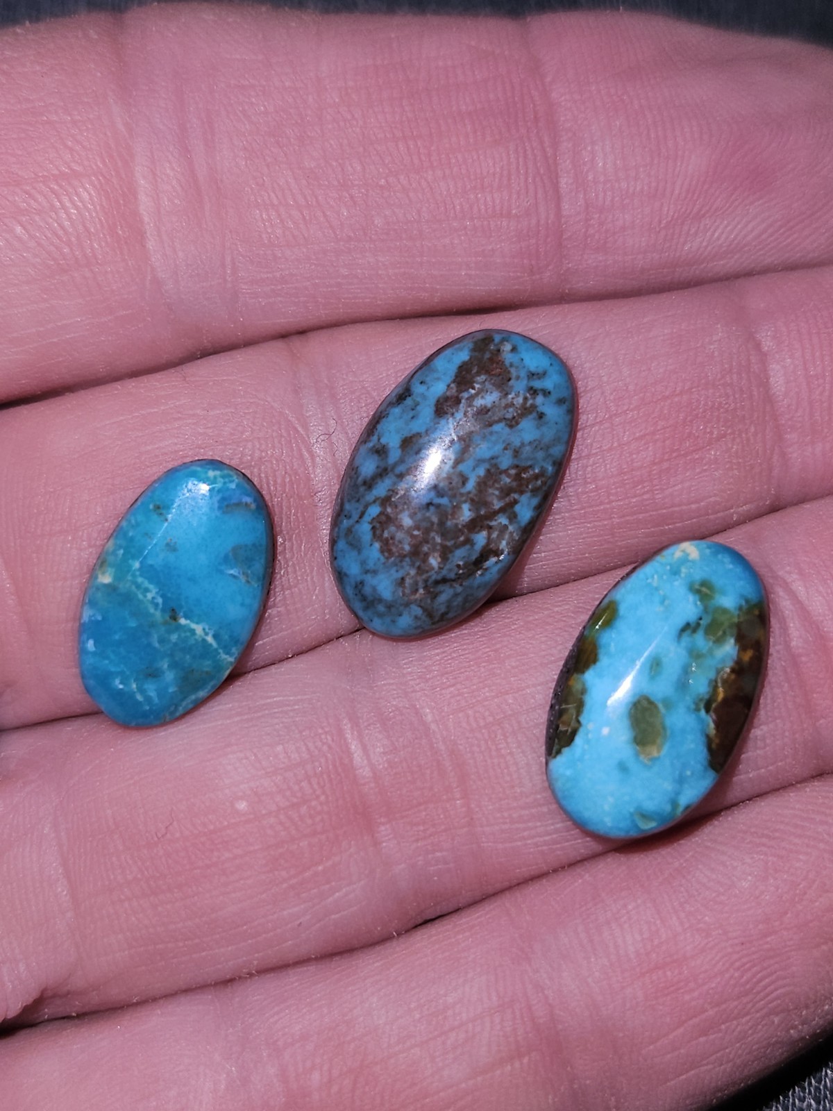 Rare Bisbee Turquoise Ovals – Backed – 7 pieces – 48.905 carats total