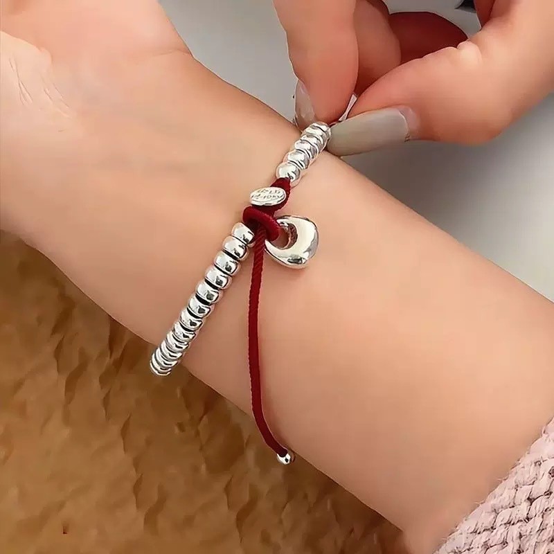 Pure silver Ping An Joy Money Chain coiled bracelet