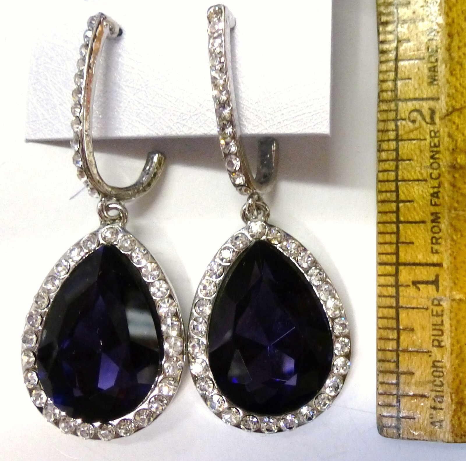 earrings – purple surrounded by rhinestones 2 1/2 inches