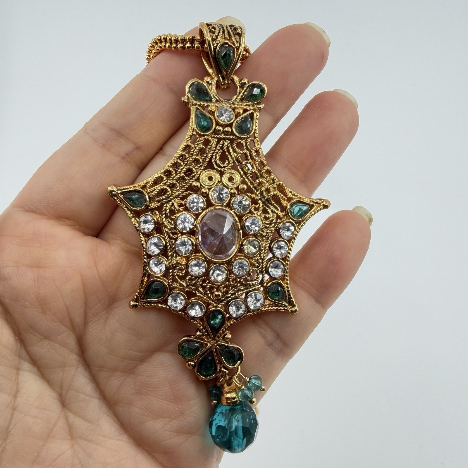 Gold Tone Ornate Multi Pointed Pendant Accented Clear Teal Rhinestone 16”