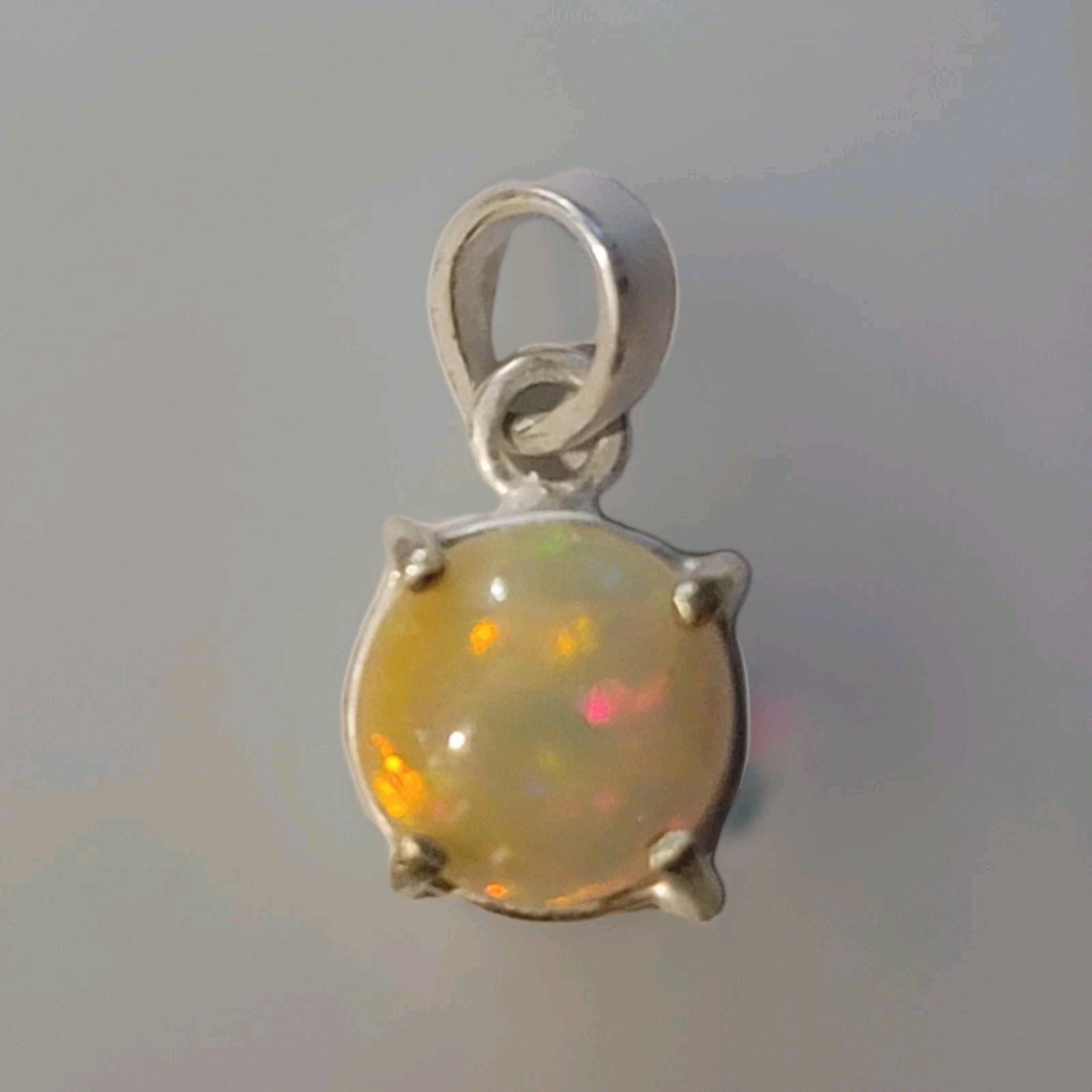 Ethiopian Fire Opal Pendant Round 10mm/925 Sterling Silver (SEE DETAILS)
