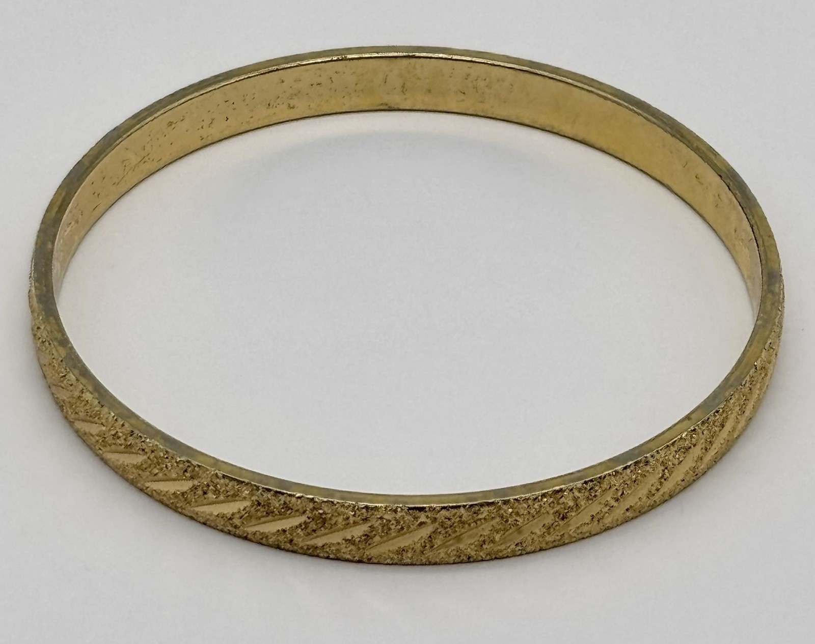 Vintage Monet Etched Textured and Shiny Gold-Tone Bangle Bracelet Signed 8-1/8″
