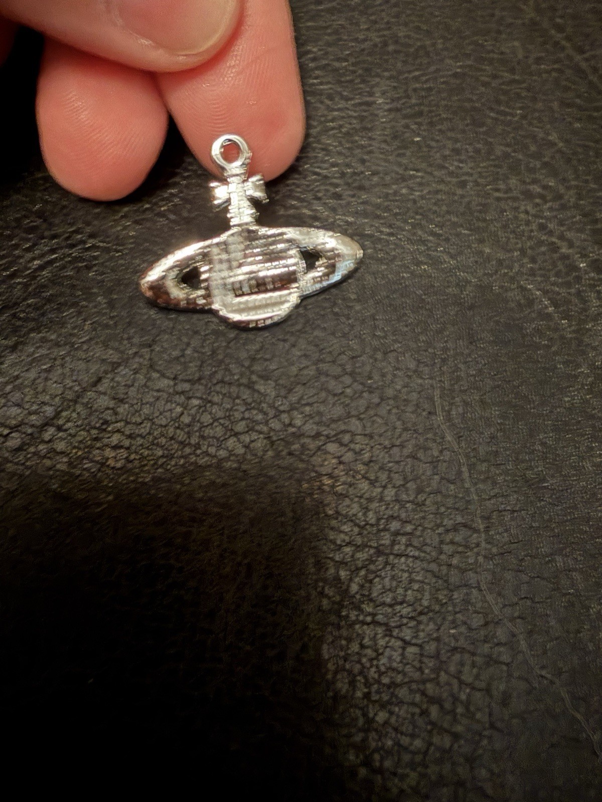 Orb pendant With a silver-tone finish with clear, rhinestones