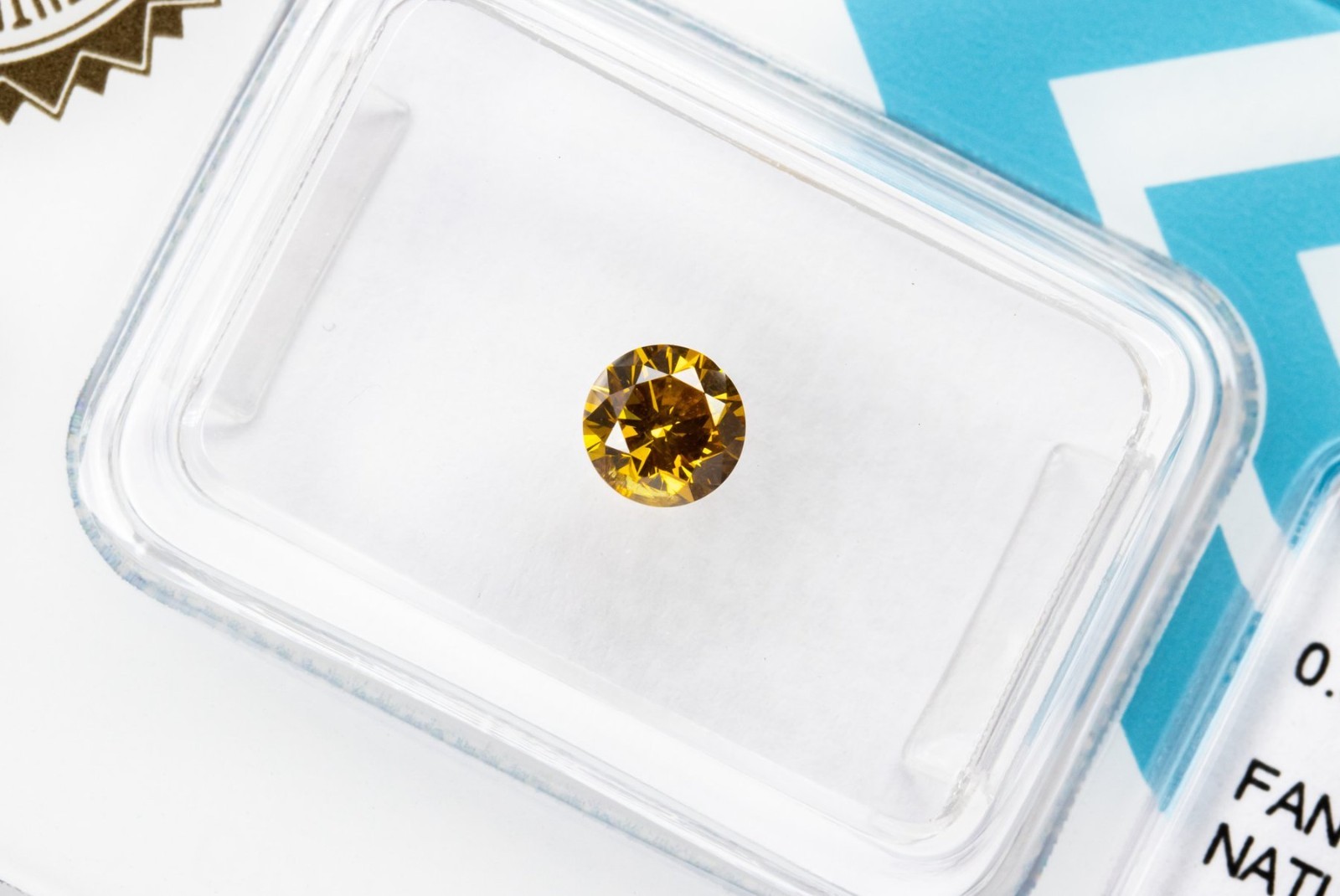 0.36 ct Natural Fancy Intense Brownish Yellow Diamond Round IGI Certified