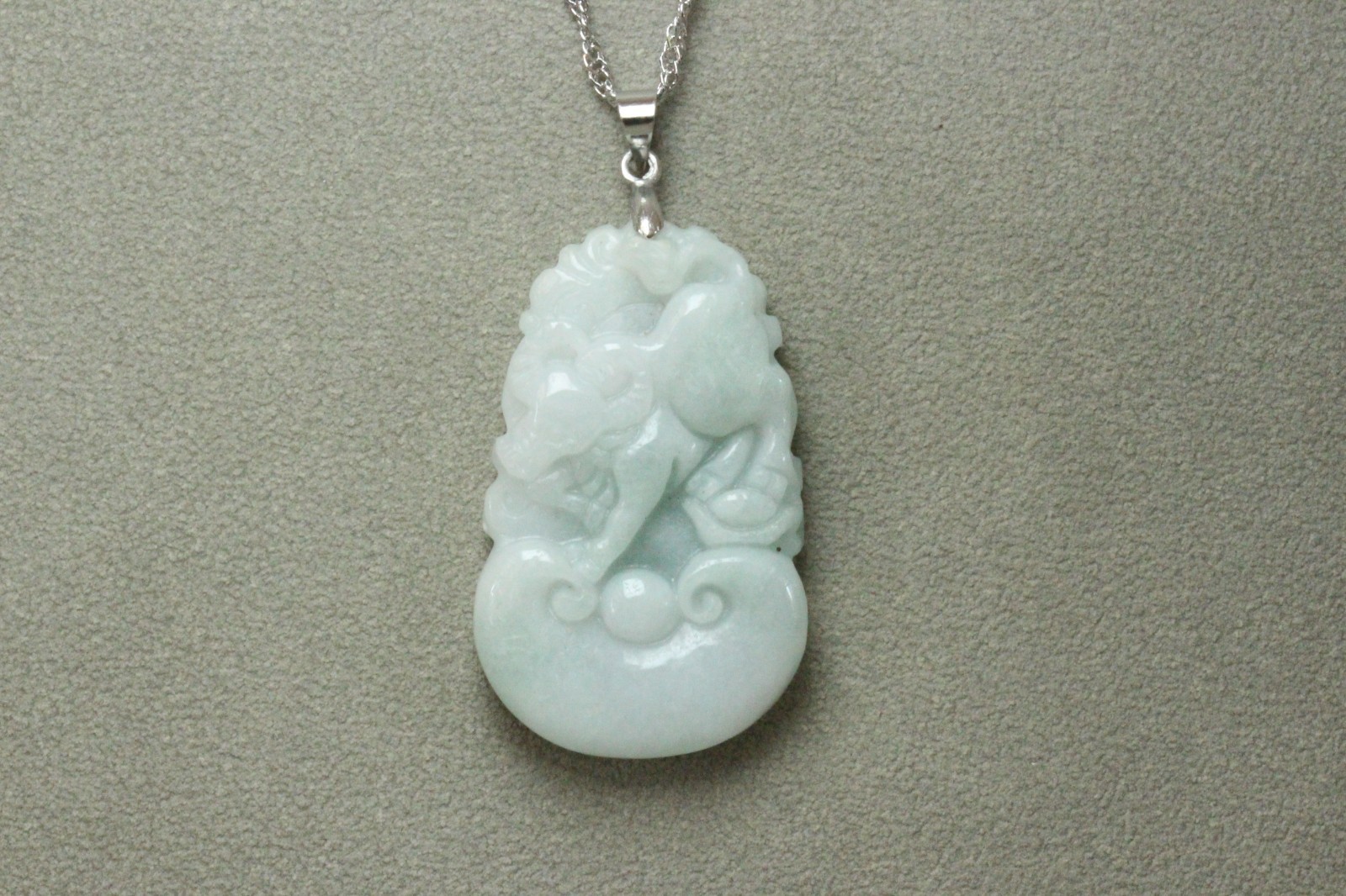 Natural White green A Jadeite jade Hand-Carved Cow (Chinese Zodiac) Pendant