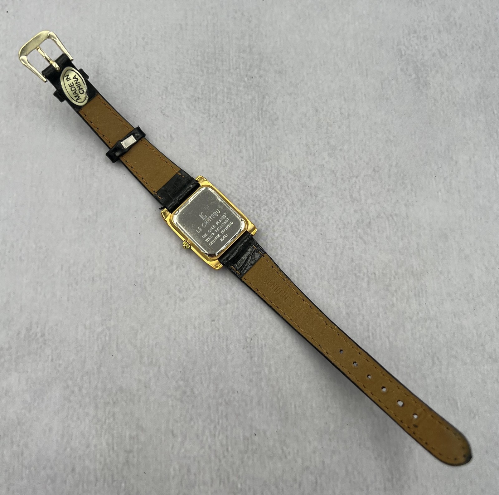 Le Chateau Women’s Black Leather Band Black Dial Genuine Diamond Dress Watch