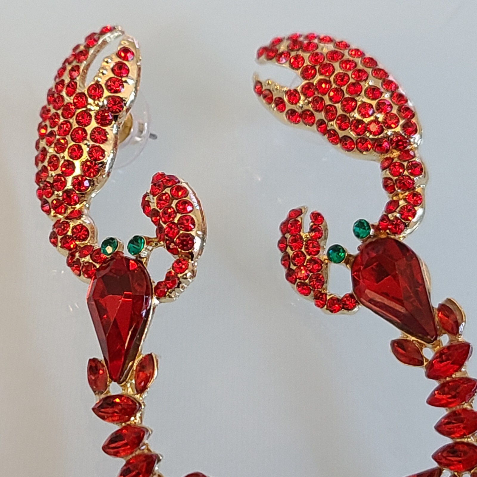 GORGEOUS RED RHINESTONE LOBSTER EARRINGS WITH GREEN EYES CRYSTALS 21/4 INCHES