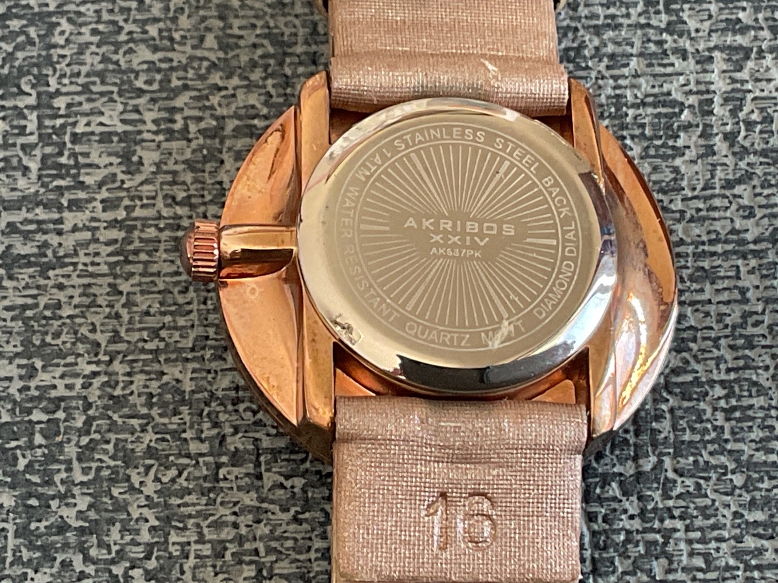 Akribos xxiv Diamond Dial woman’s wristwatch minimalist numberless
