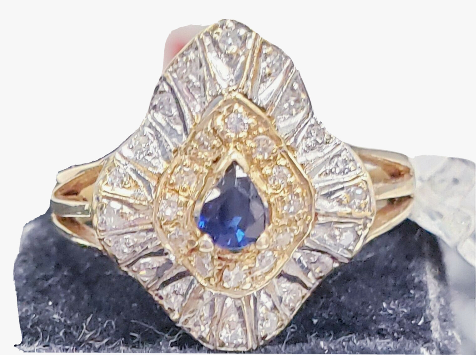 Wavering diamond (.35) and sapphire (.10) ring, 14 kt yellow gold 3.6gm