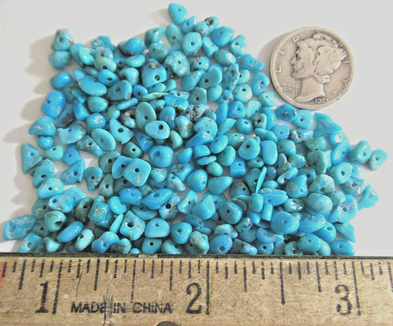 SLEEPING BEAUTY TURQUOISE 1/2 OZ DRILLED NUGGETS 4 X 3mm TO 7 X 4mm #606