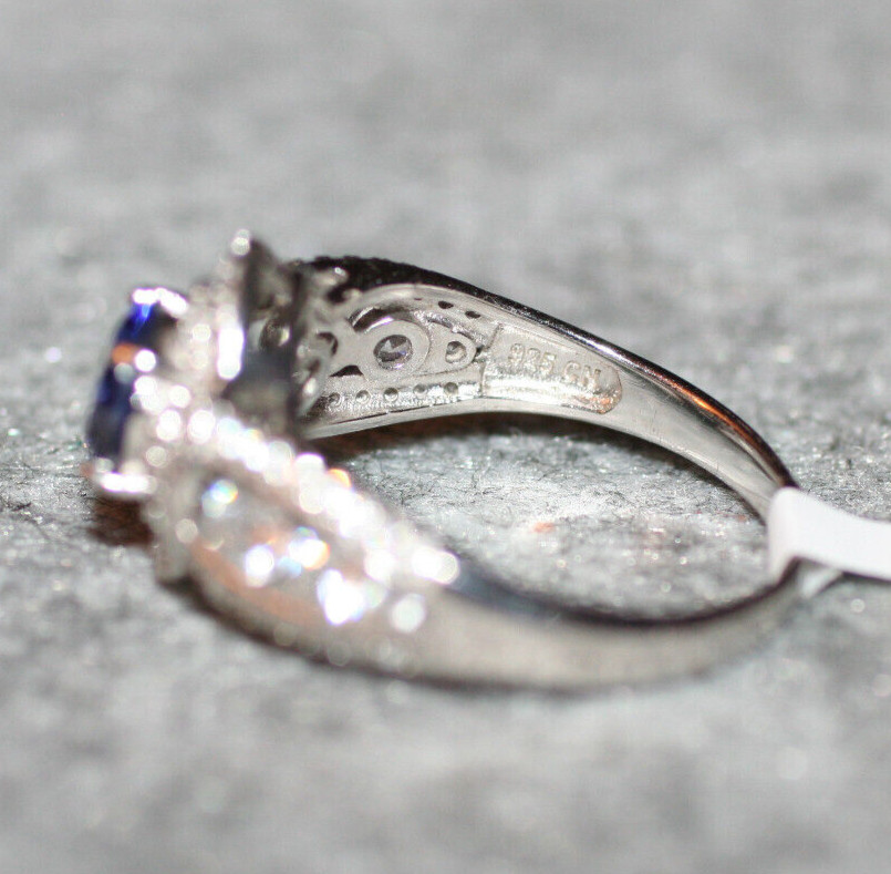 4.85CTW Blue Tanzanite / 2.4CTW White Zircon Rhodium over Sterling Ring SZ 12