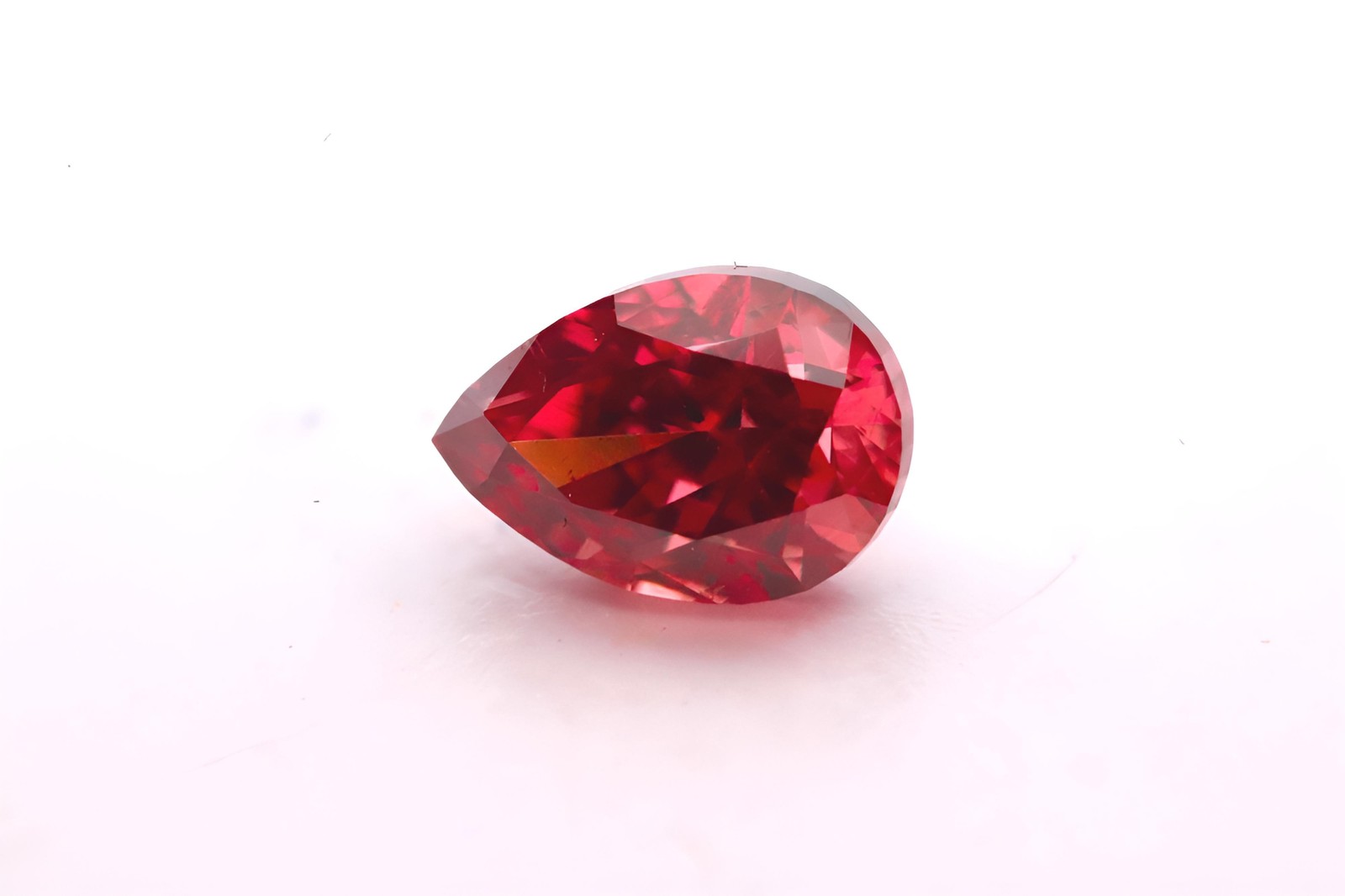 0.09ct Pear Mod Brilliant Fancy Deep Brown-Pink Diamond Red GIA Certified