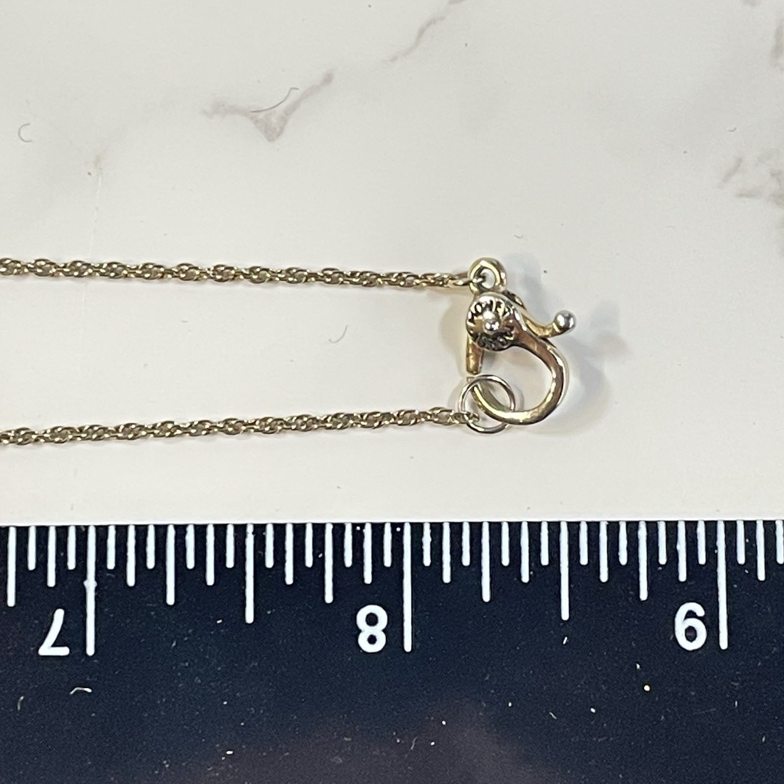 Vintage Monet Gold Tone Topaz Rhinestone Swirl Circle Pendant Necklace Chain 16″