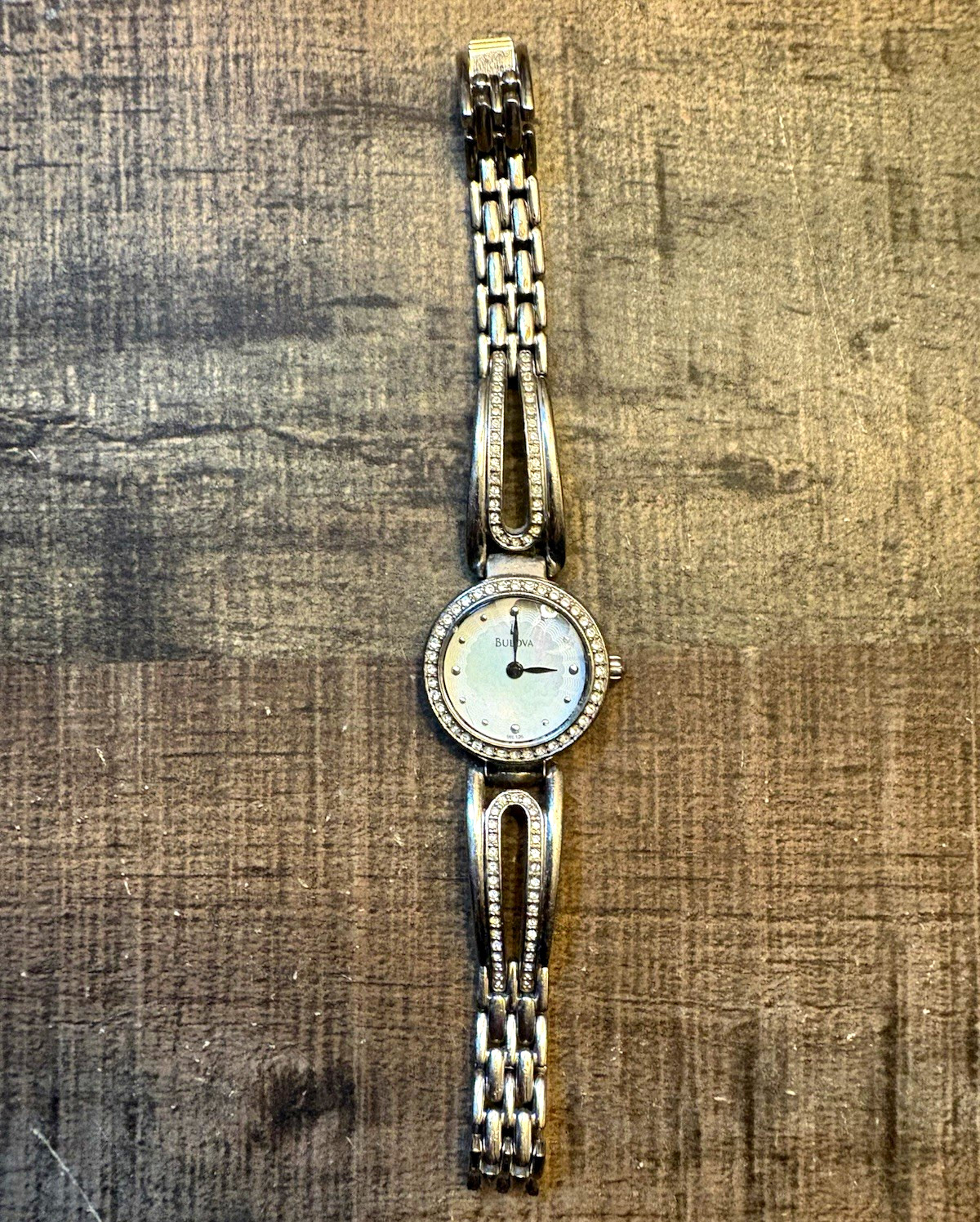 Bulova Women’s Quartz Analog Dress Watch White Dial Gem Bezel 30m Steel
