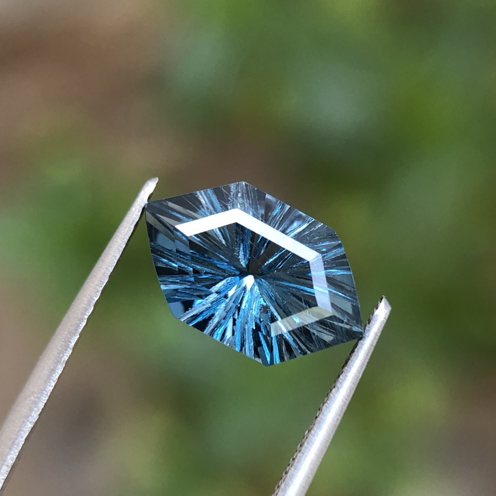 Natural London Blue Topaz Fantasy Cut Long Hexagon 12.5 MM 3.90 Carat.