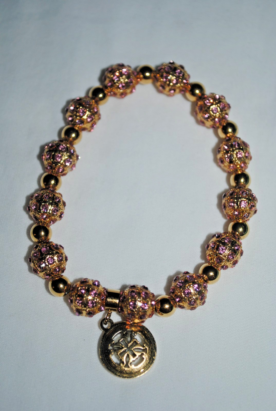 Rustic Cuff bracelet, goldtone beads, purple stones, goldtone charm, w/RC bag