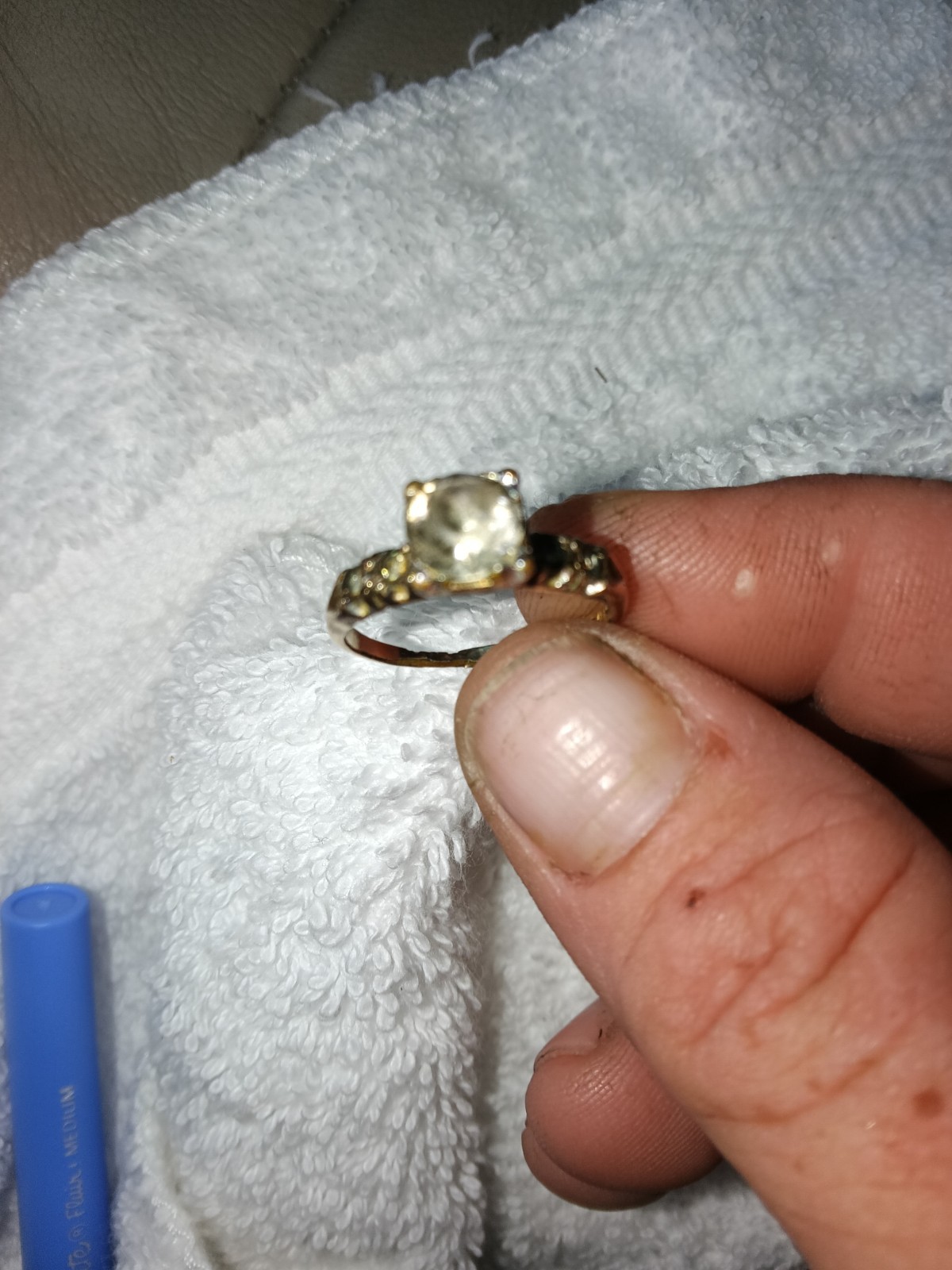 vintage 14k white gold engagement ring a central diamond and side accents.