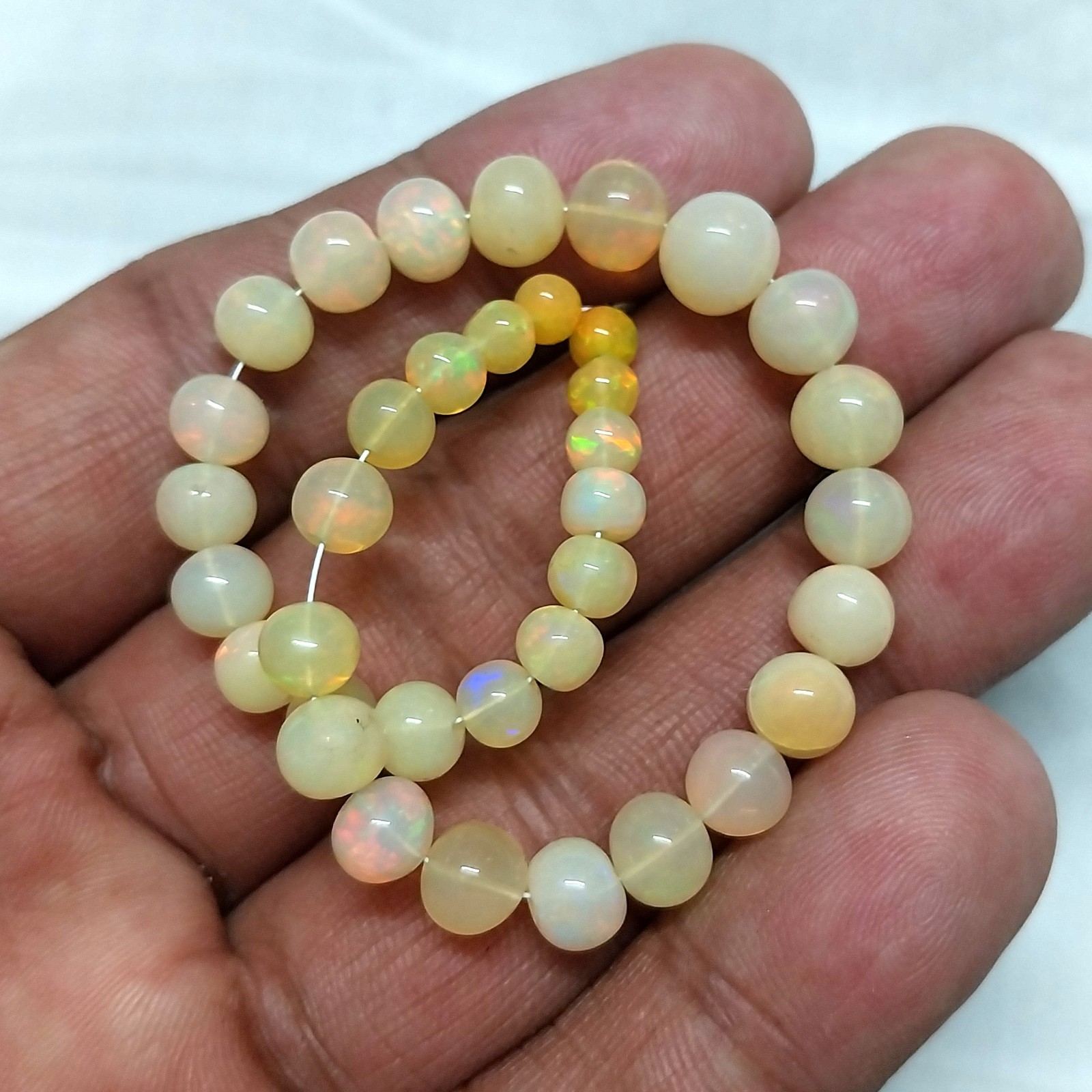 33 Carat 4.5 to 8 MM Natural Smooth Ethiopian Opal Ball Shape 8 inch Beads