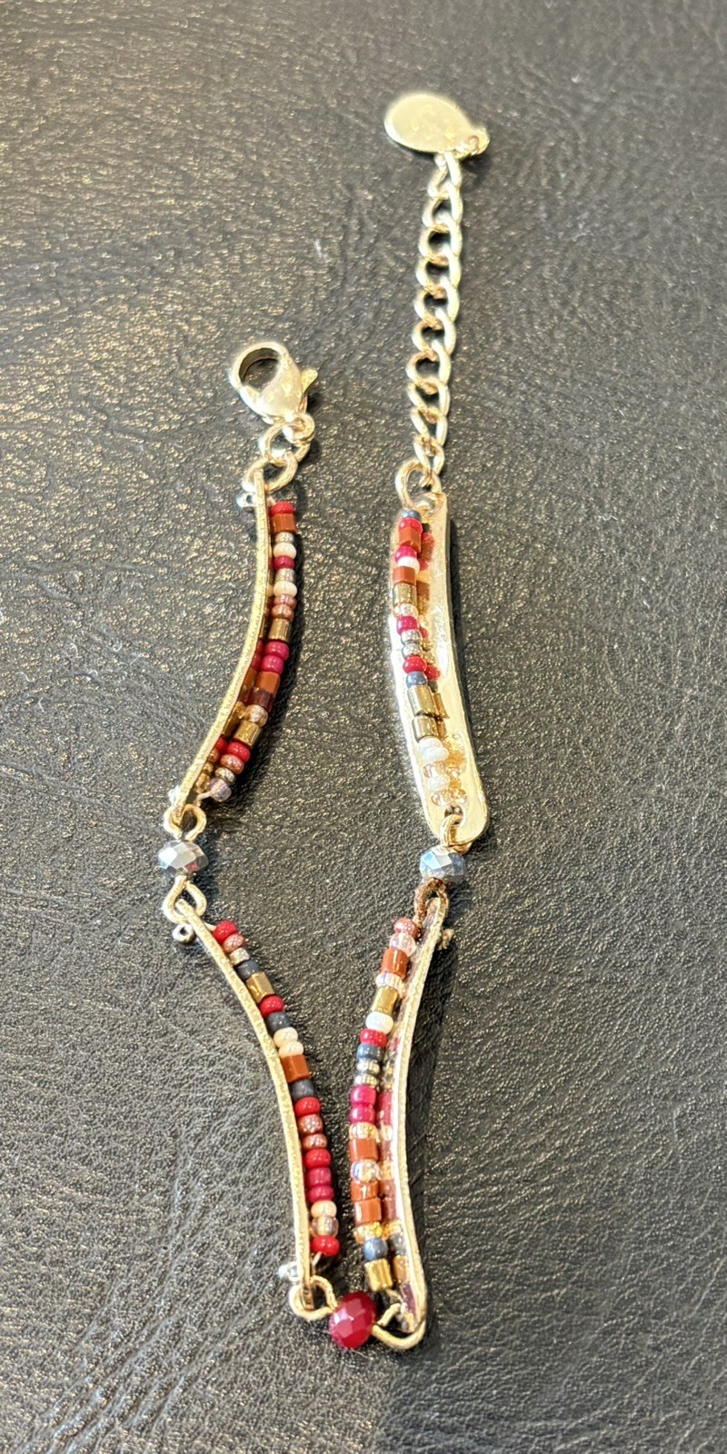 Accessorize Golden tone bracelet adjustable.